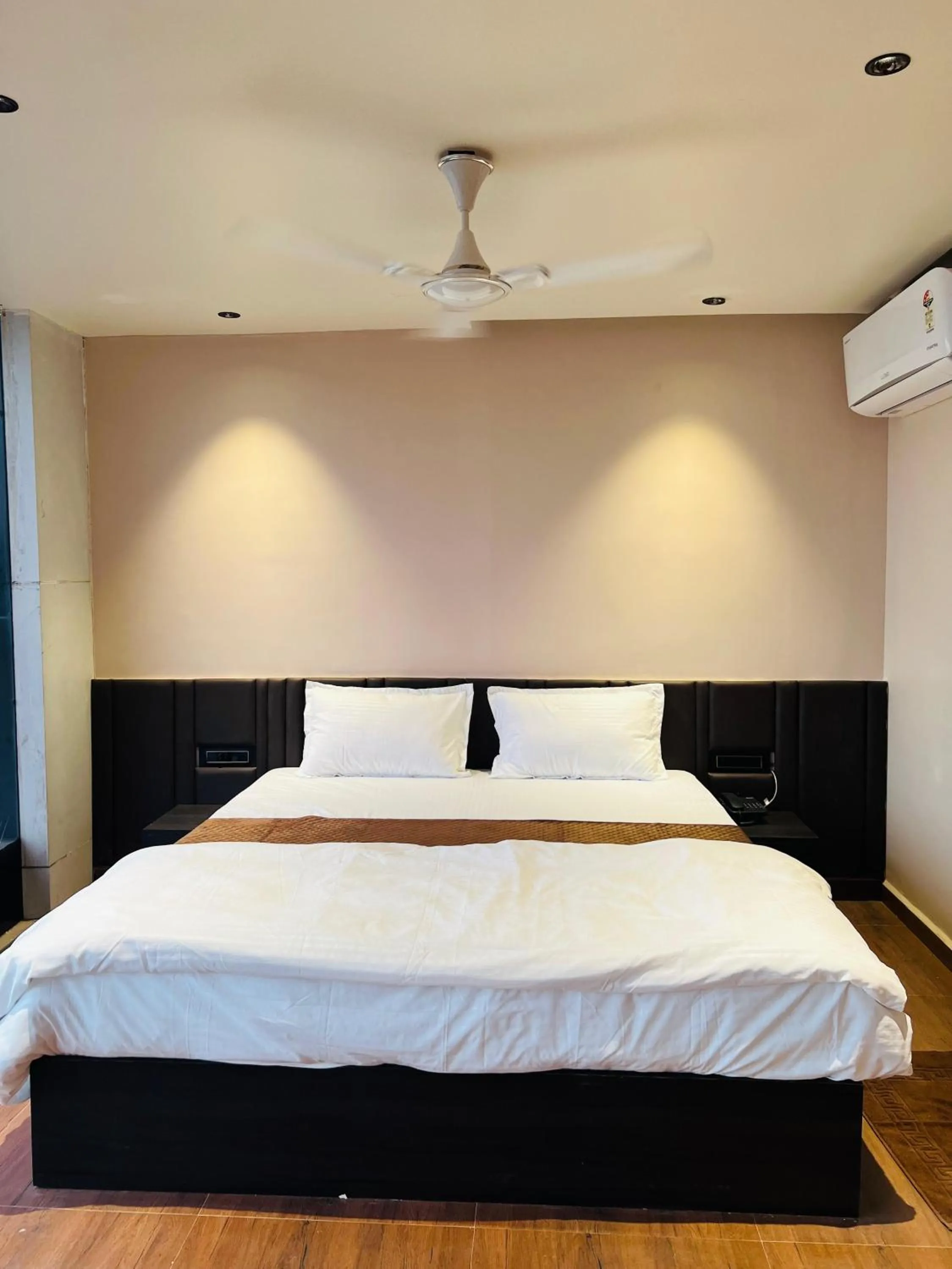 Bed in Hotel Presidency - Best Hotel in Surat