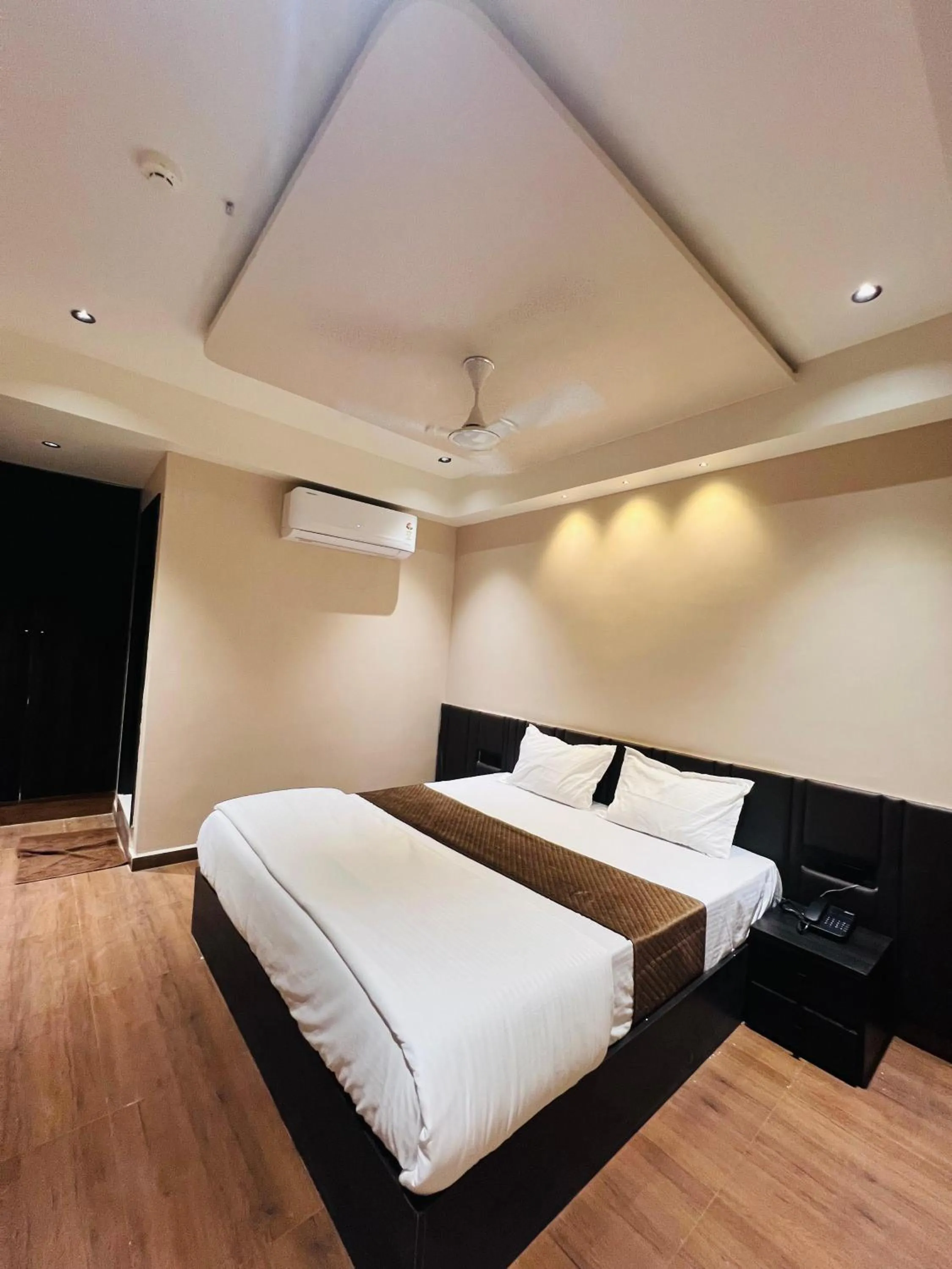 Bed in Hotel Presidency - Best Hotel in Surat