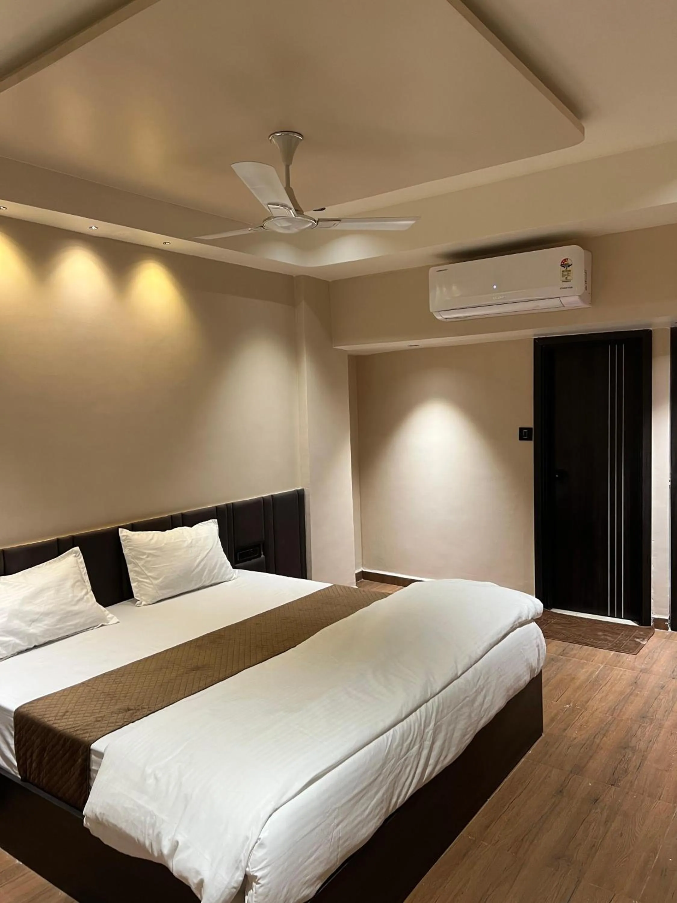 Bed in Hotel Presidency - Best Hotel in Surat