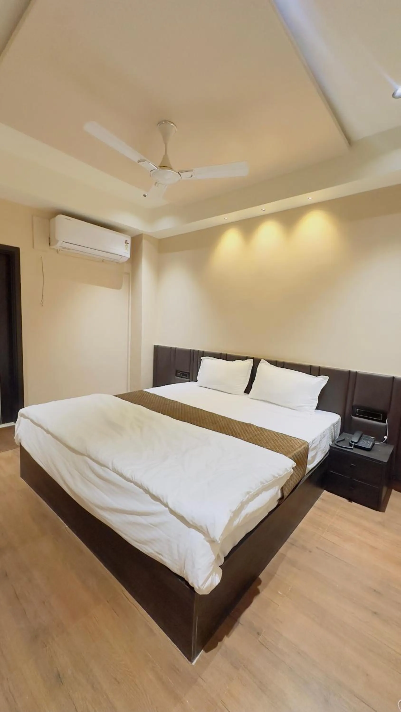 Bed in Hotel Presidency - Best Hotel in Surat