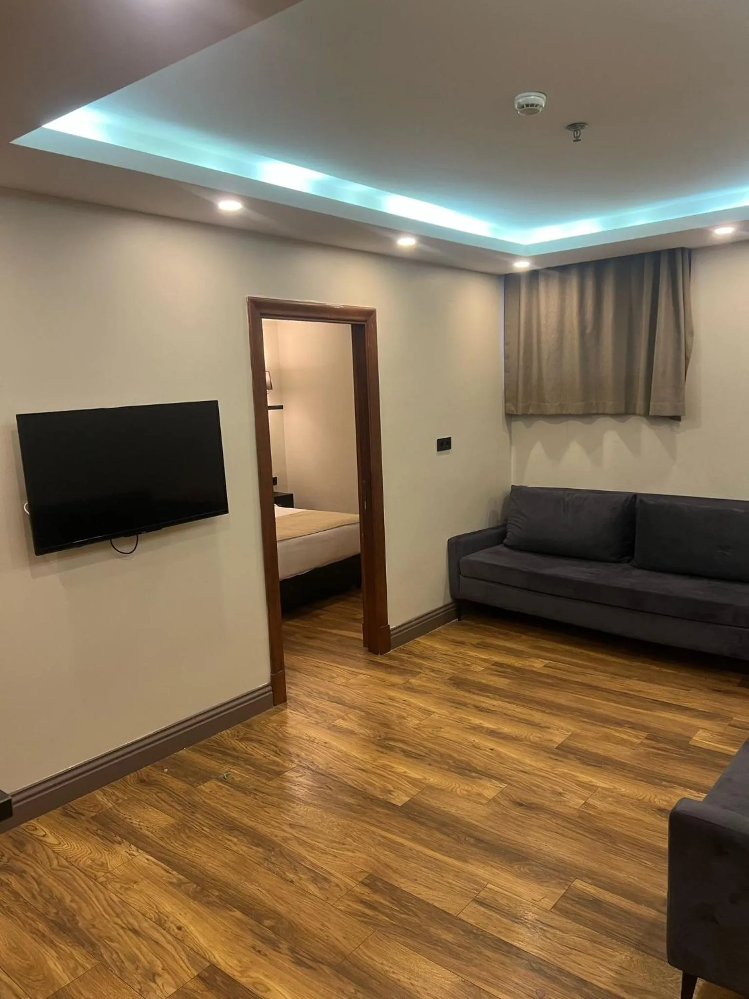 Communal lounge/ TV room in The Way Hotel