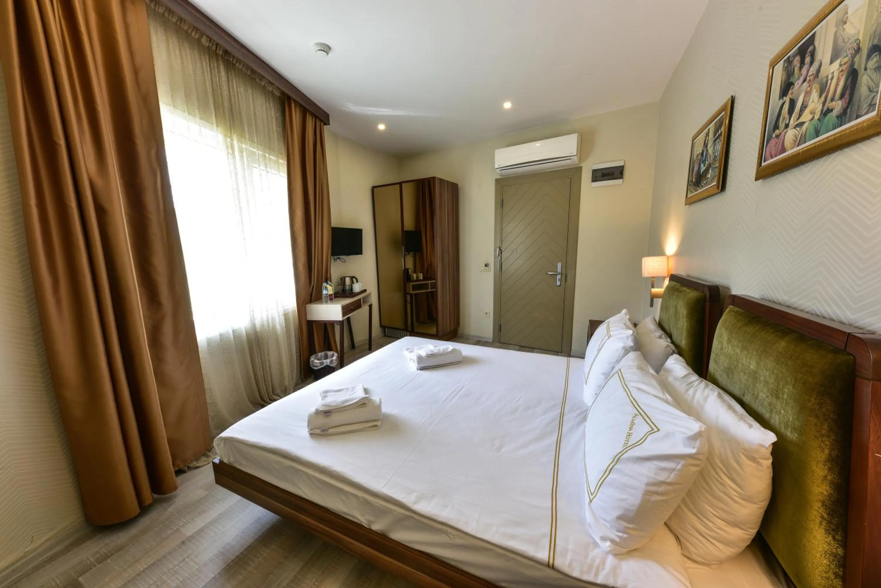 Bed in Almina Guest House