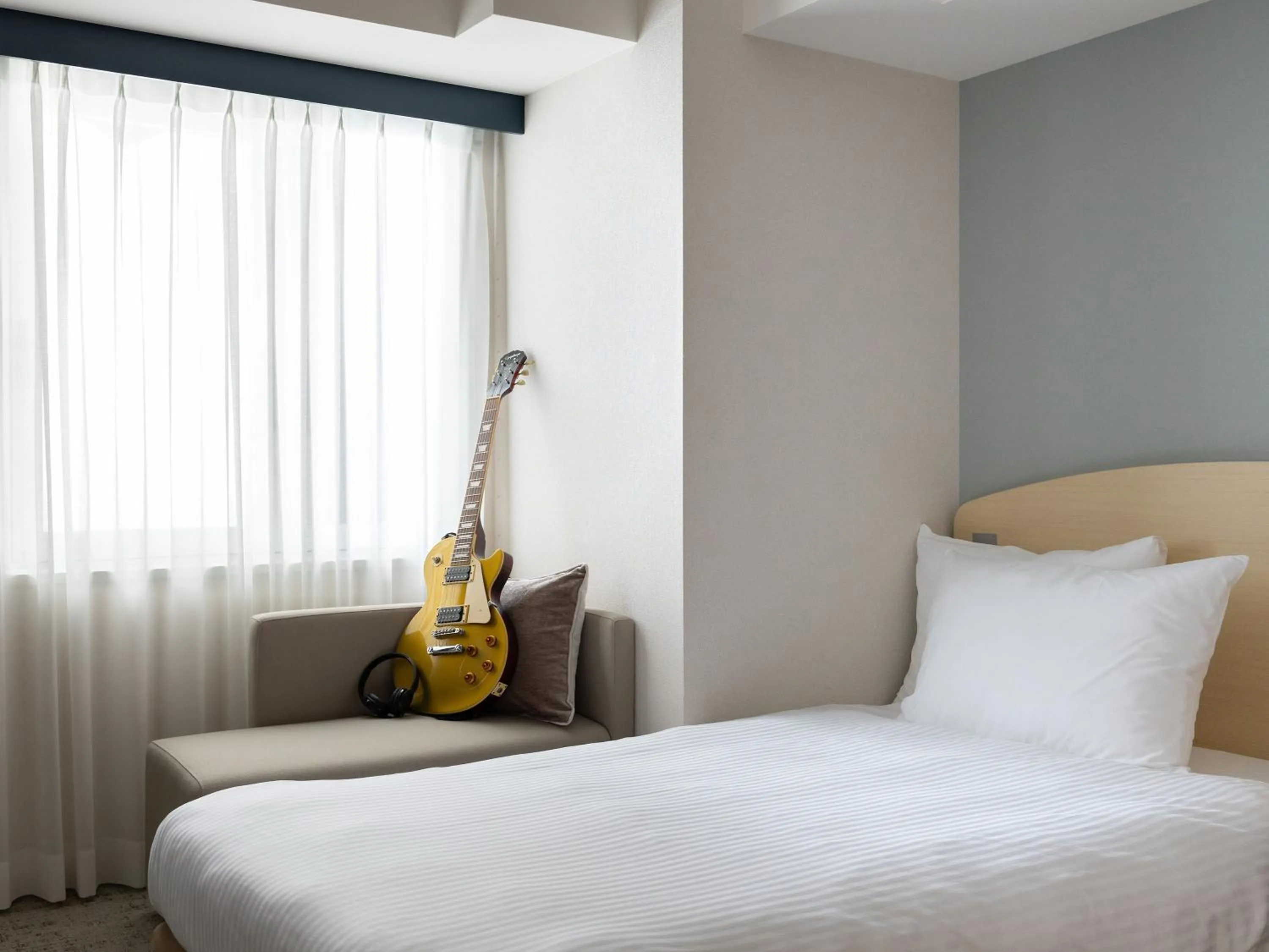 room service, Bed in Brackets Hotel Osaka Hommachi