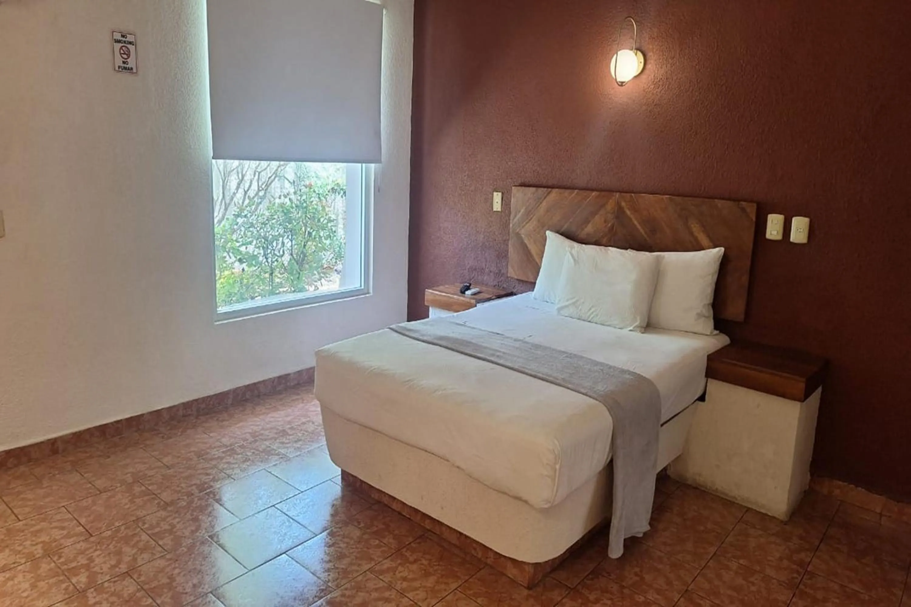 Bedroom, Bed in Capital O Hotel Rolovi Cancún