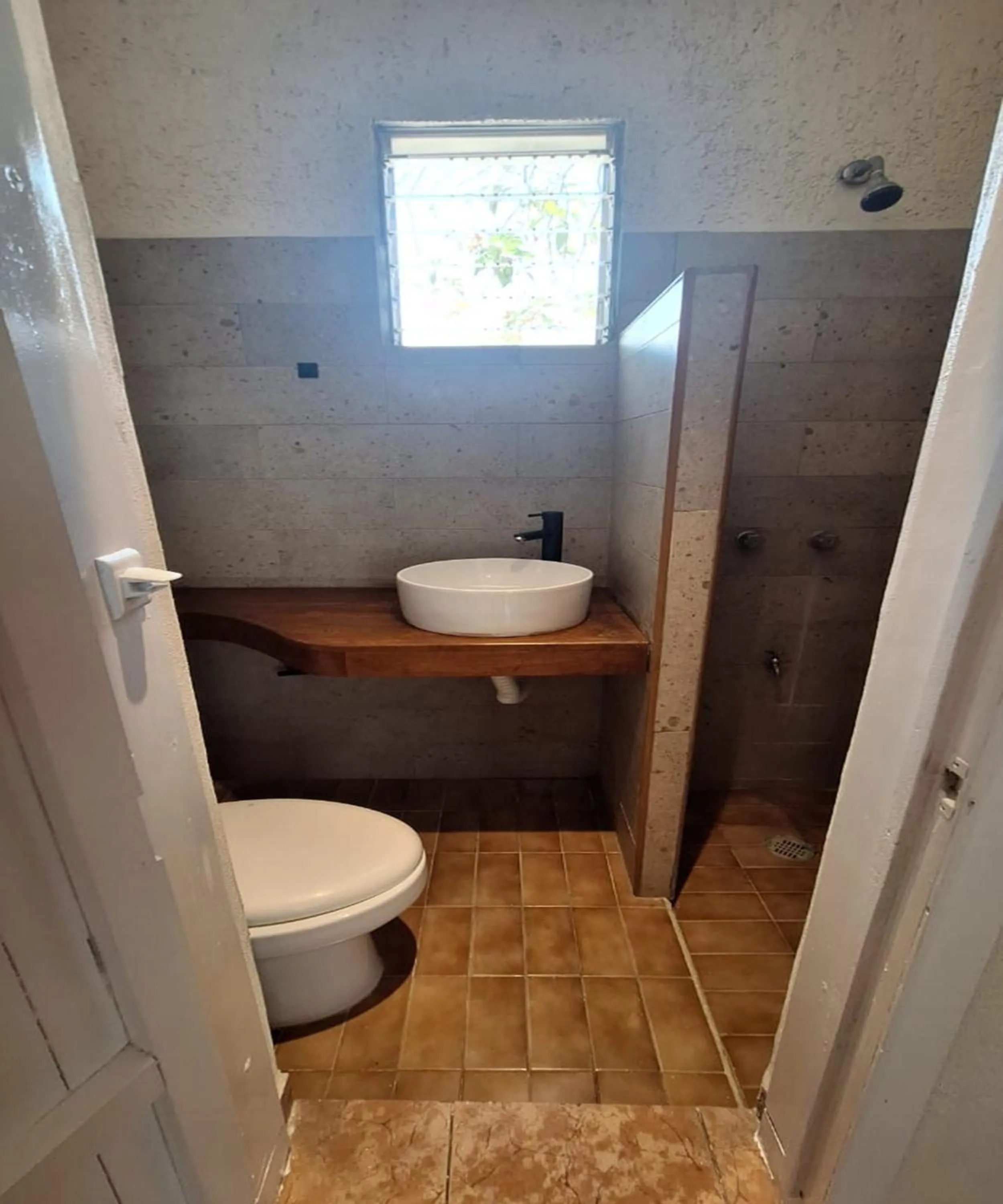 Bathroom in Capital O Hotel Rolovi Cancún