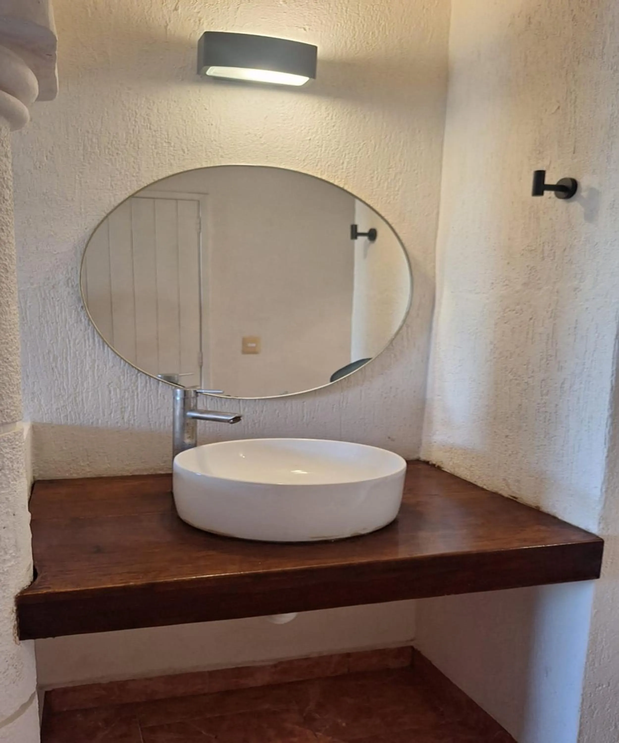 Bathroom in Capital O Hotel Rolovi Cancún