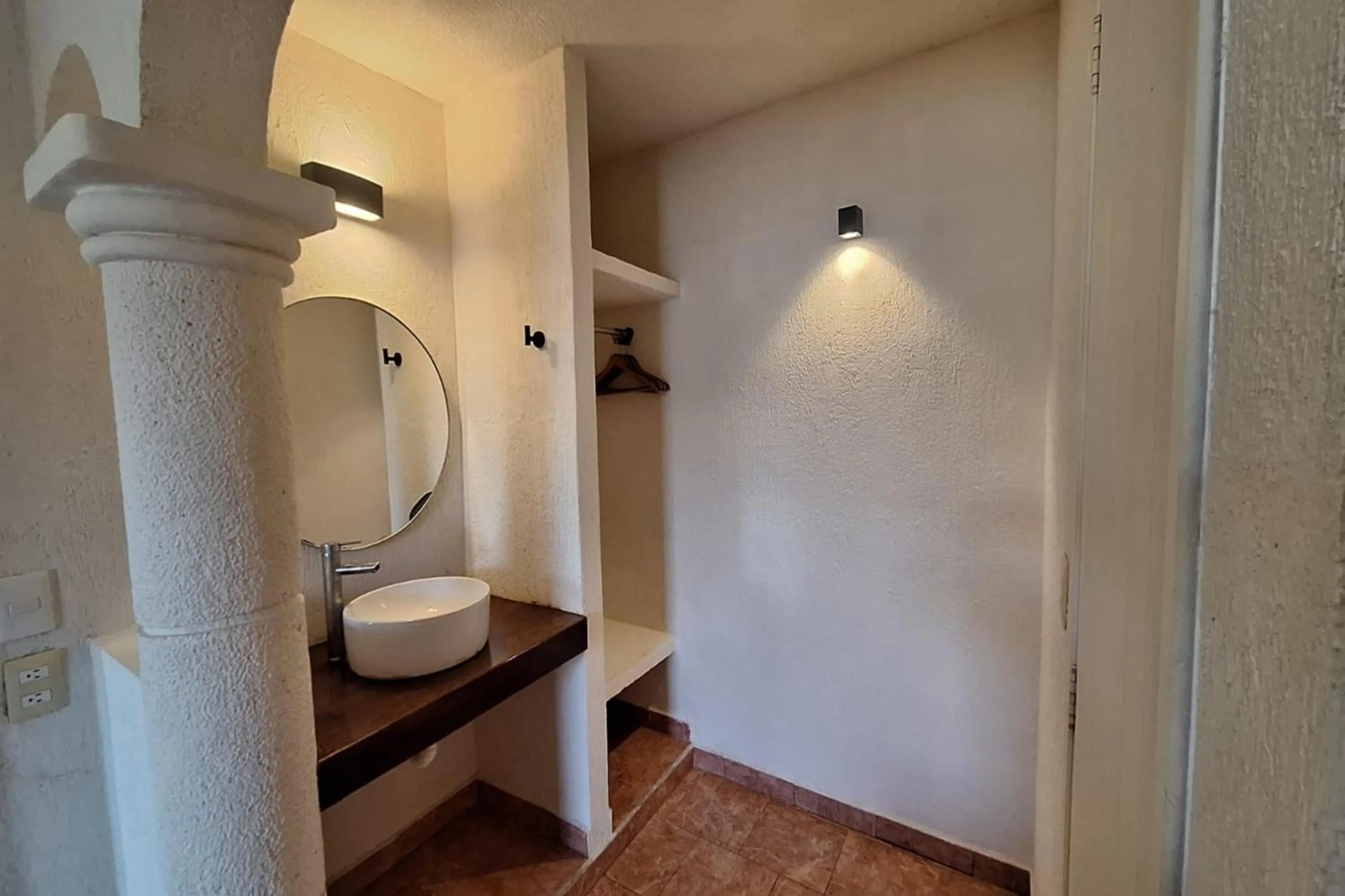 Bathroom in Capital O Hotel Rolovi Cancún