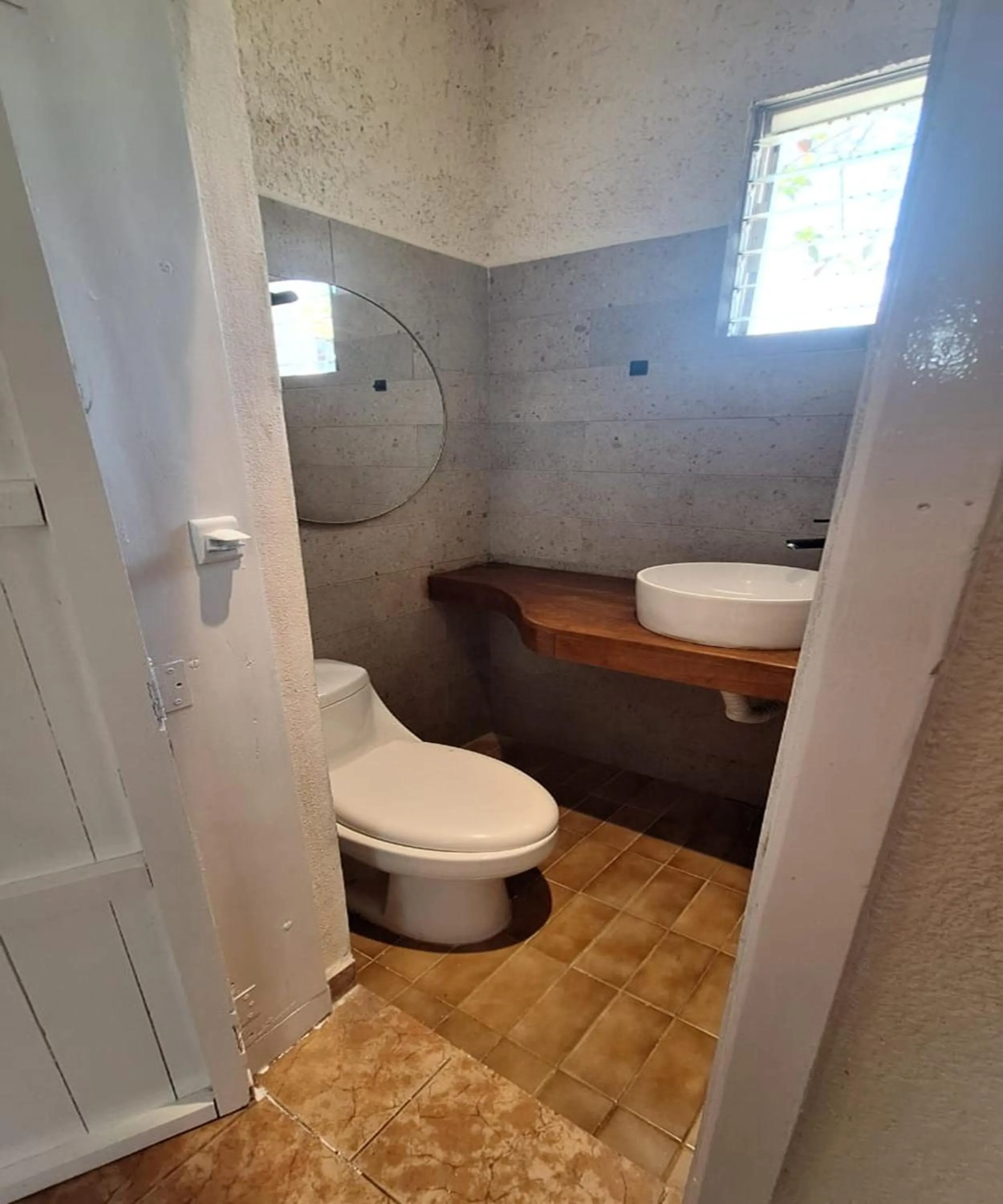 Bathroom in Capital O Hotel Rolovi Cancún