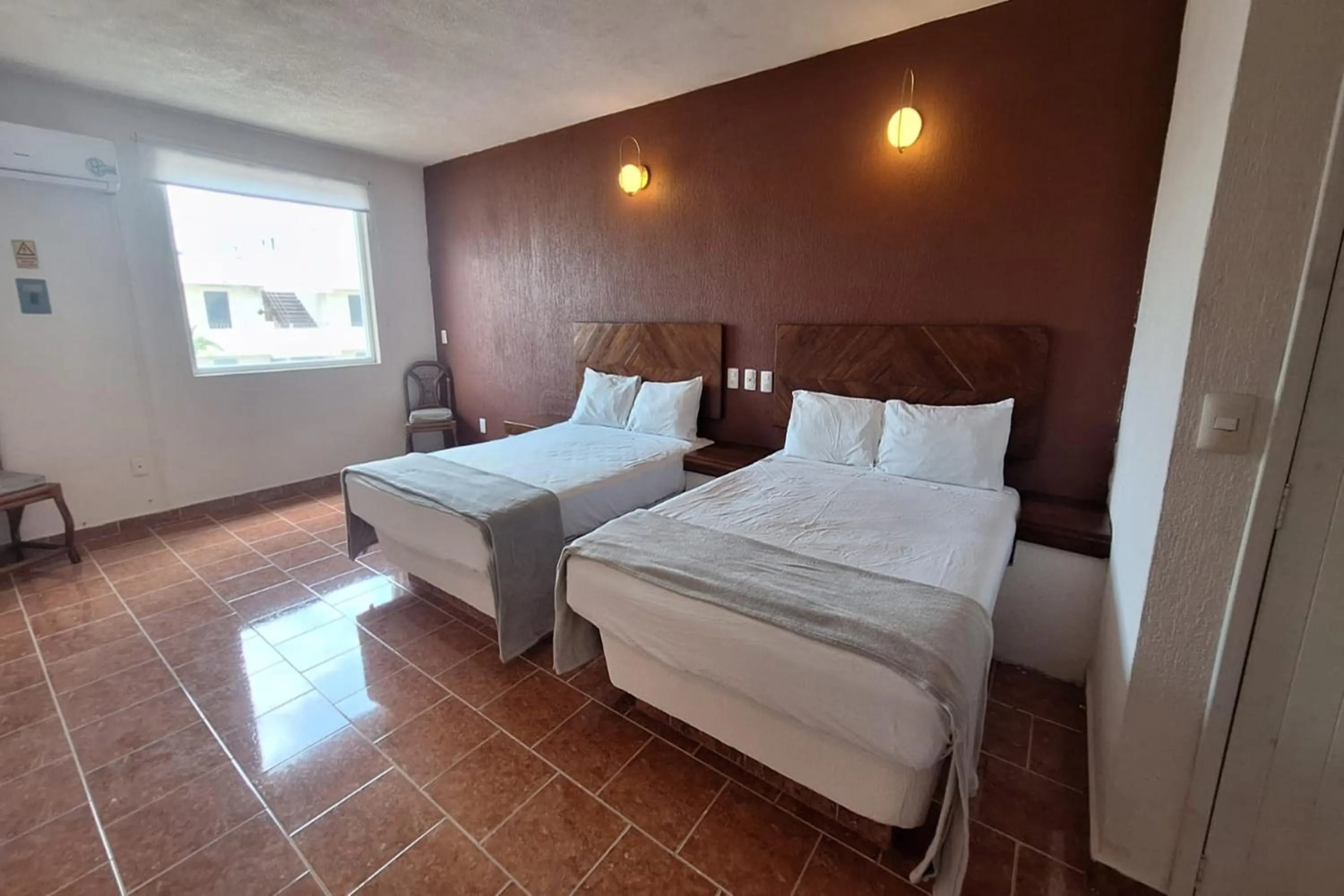 Bedroom, Bed in Capital O Hotel Rolovi Cancún