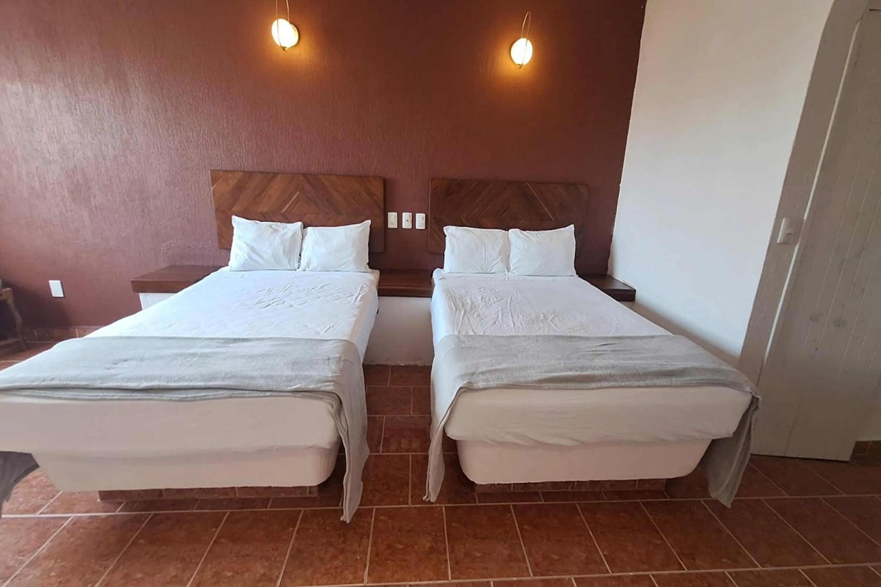 Bedroom, Bed in Capital O Hotel Rolovi Cancún