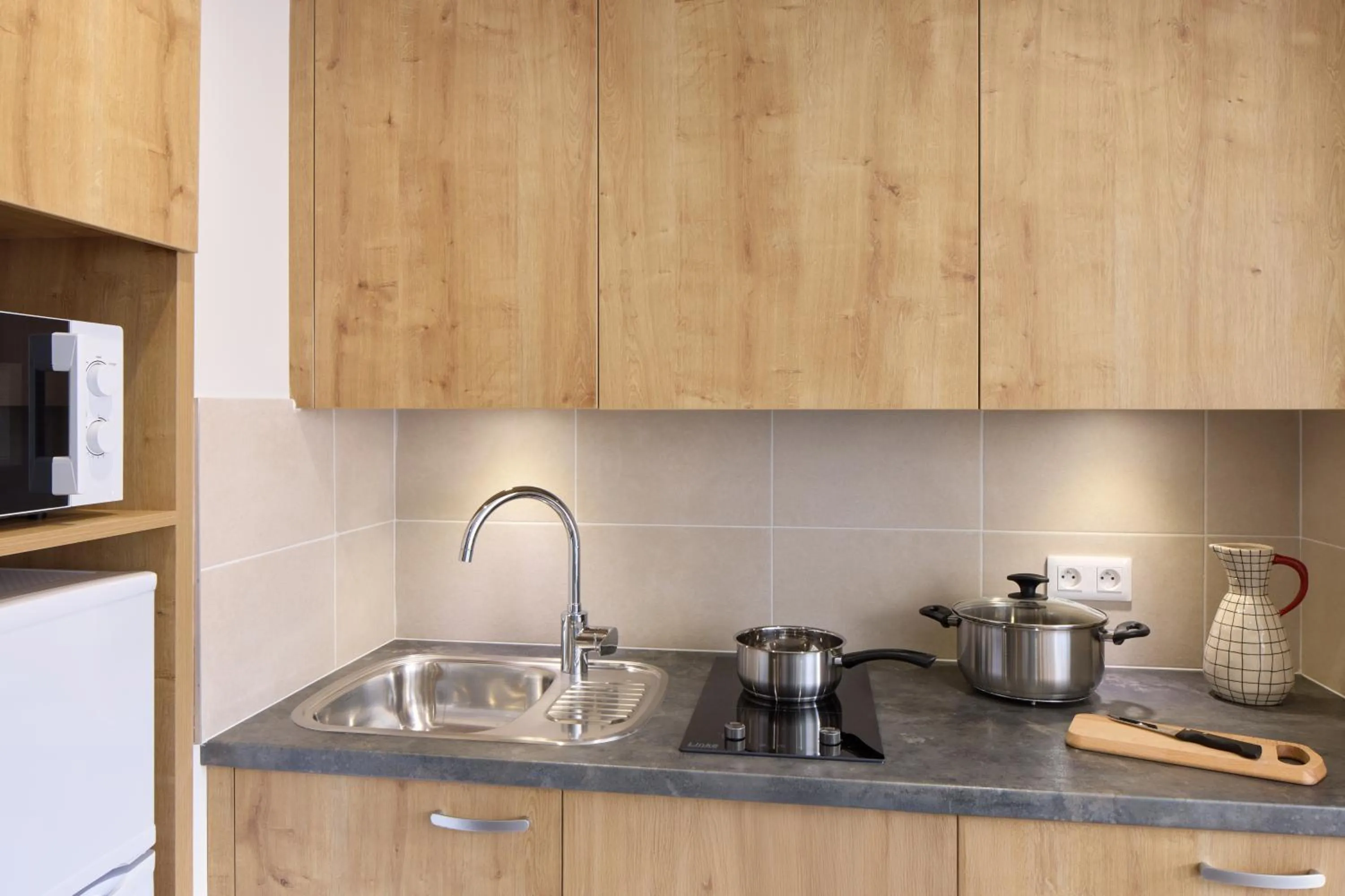 Kitchen or kitchenette in Quality Aparthotel Cholet