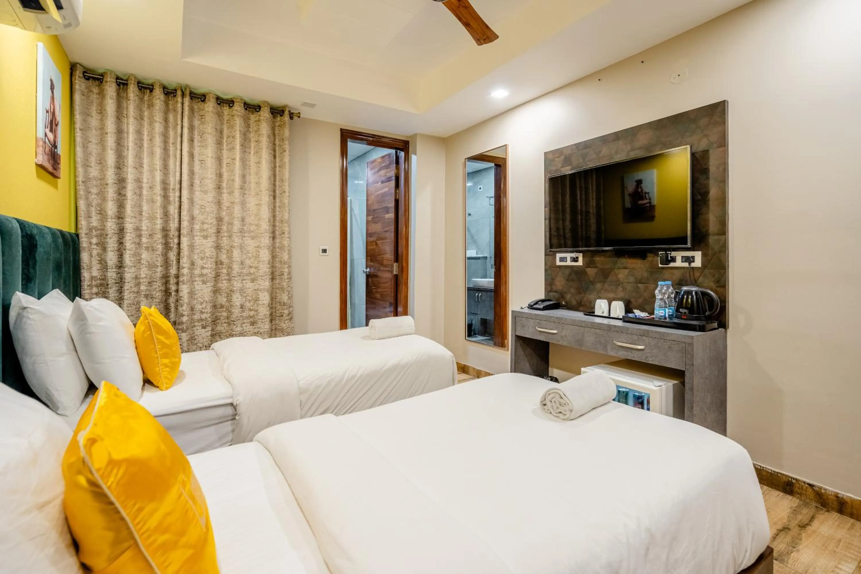 Photo of the whole room, Bed in Lime Tree Hotel - Near Medanta Hospital