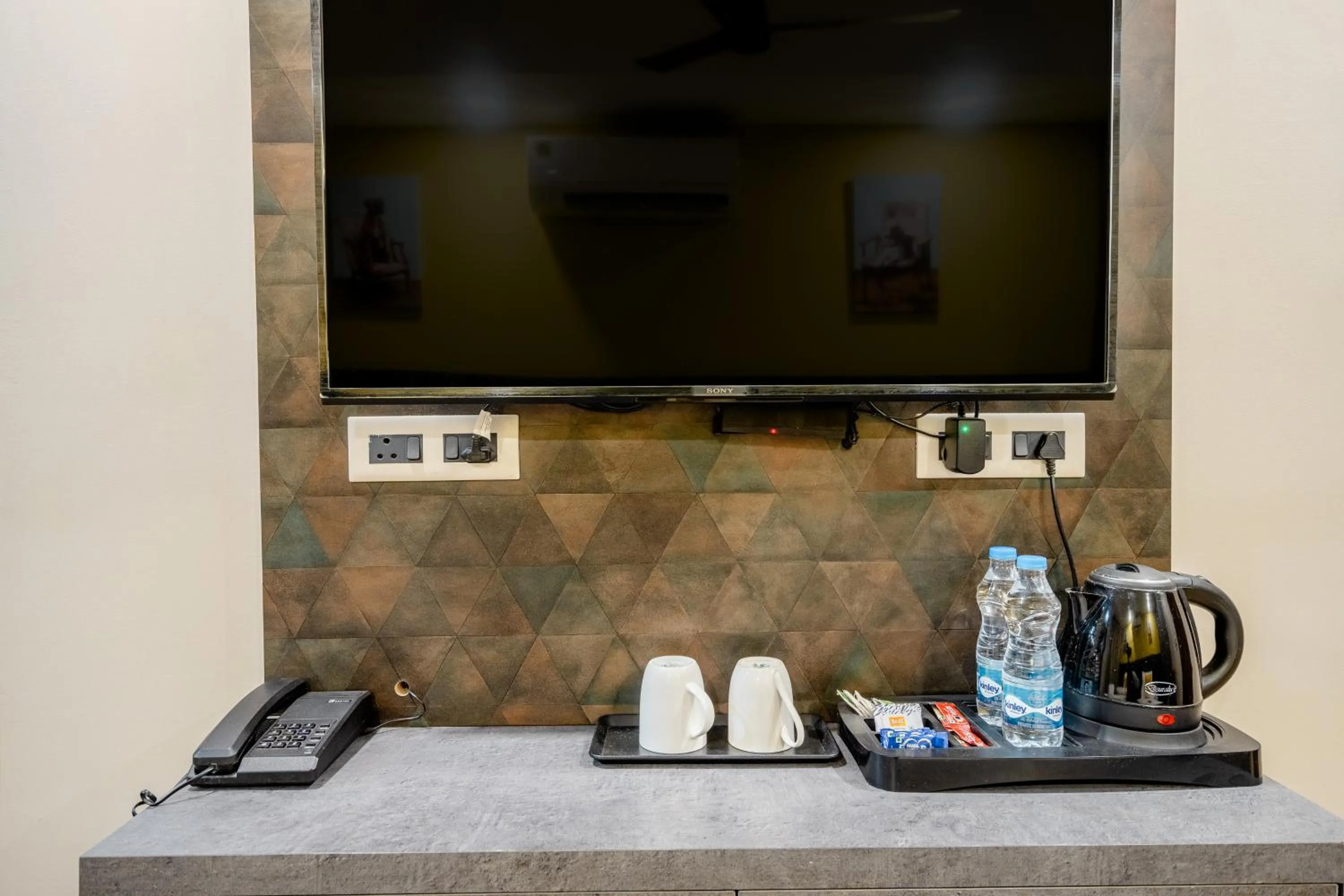 TV and multimedia in Lime Tree Hotel - Near Medanta Hospital