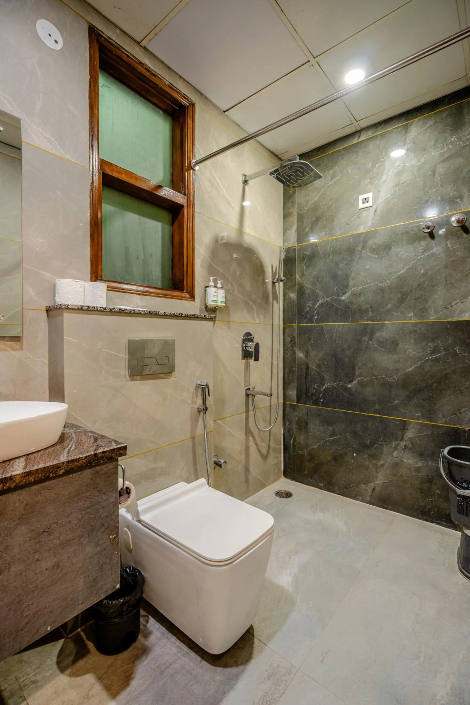 Bathroom in Lime Tree Hotel - Near Medanta Hospital