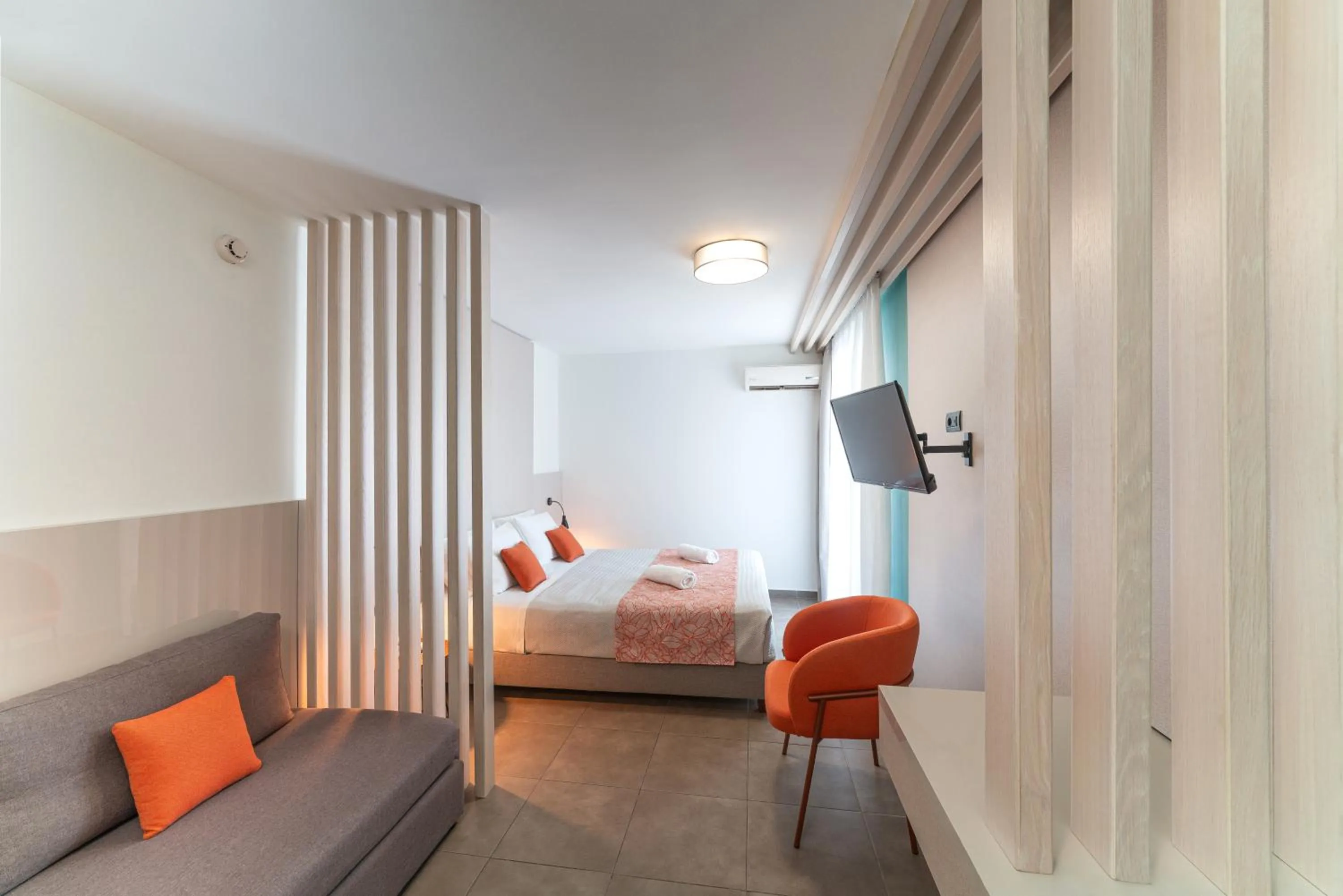 Bedroom, Bed in Amphitryon City Hotel