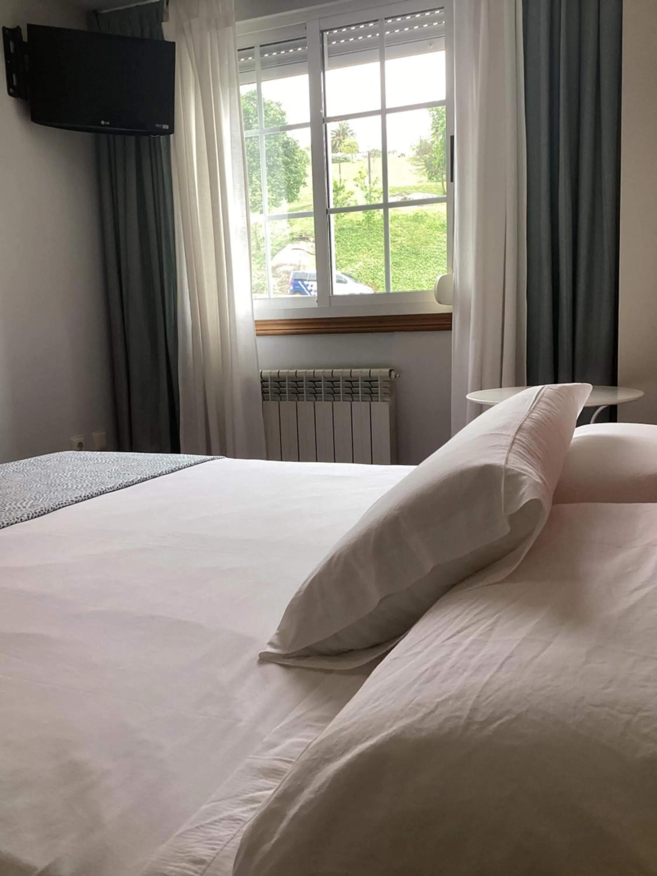 Bed in Saudade Hostal Cafetería