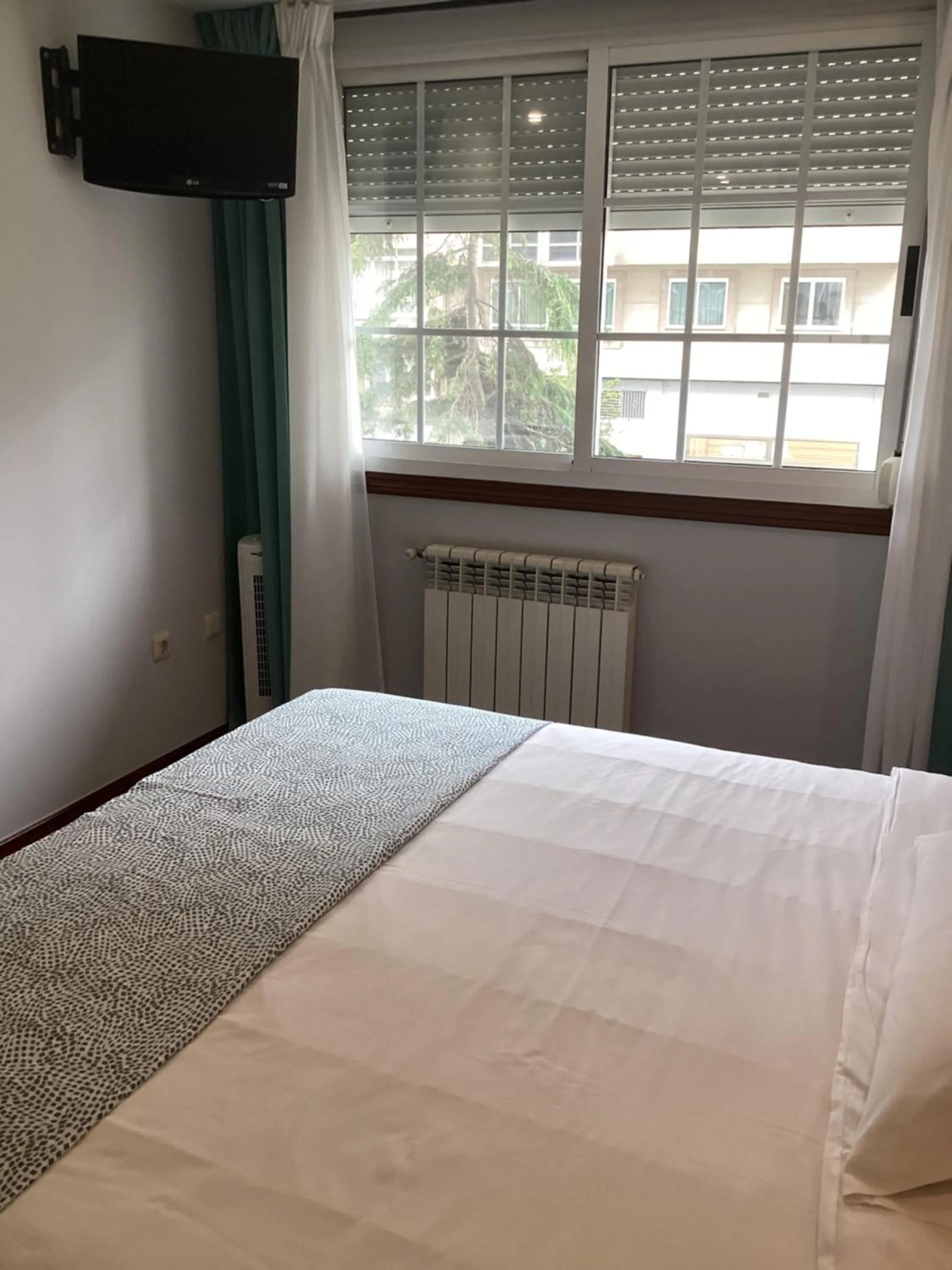 Bed in Saudade Hostal Cafetería