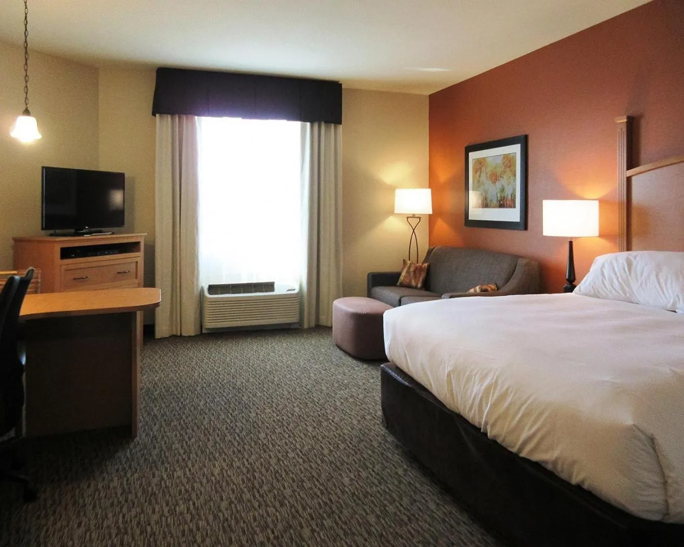 Bed in MainStay Suites Sidney - Medical Center