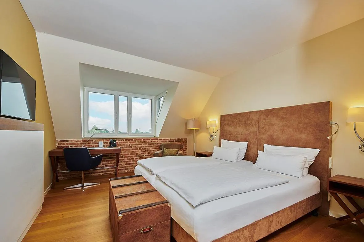 Photo of the whole room, Bed in Hotel Hafenspeicher