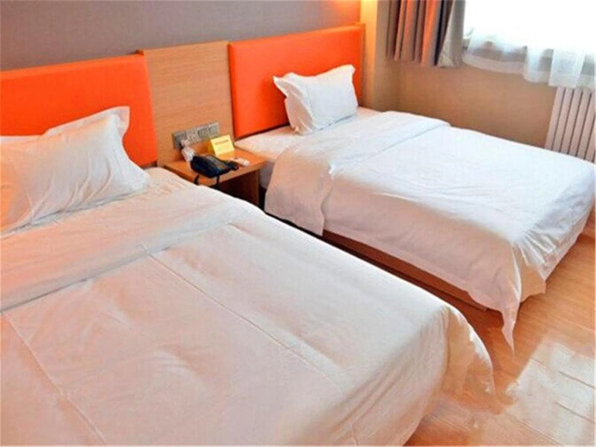 Bed in IU Hotel Beijing West Coach Station Liuliqiao East Metro Station