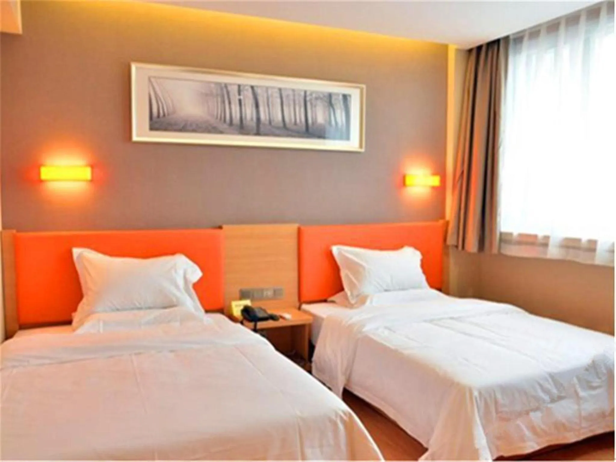 Bed in IU Hotel Beijing West Coach Station Liuliqiao East Metro Station