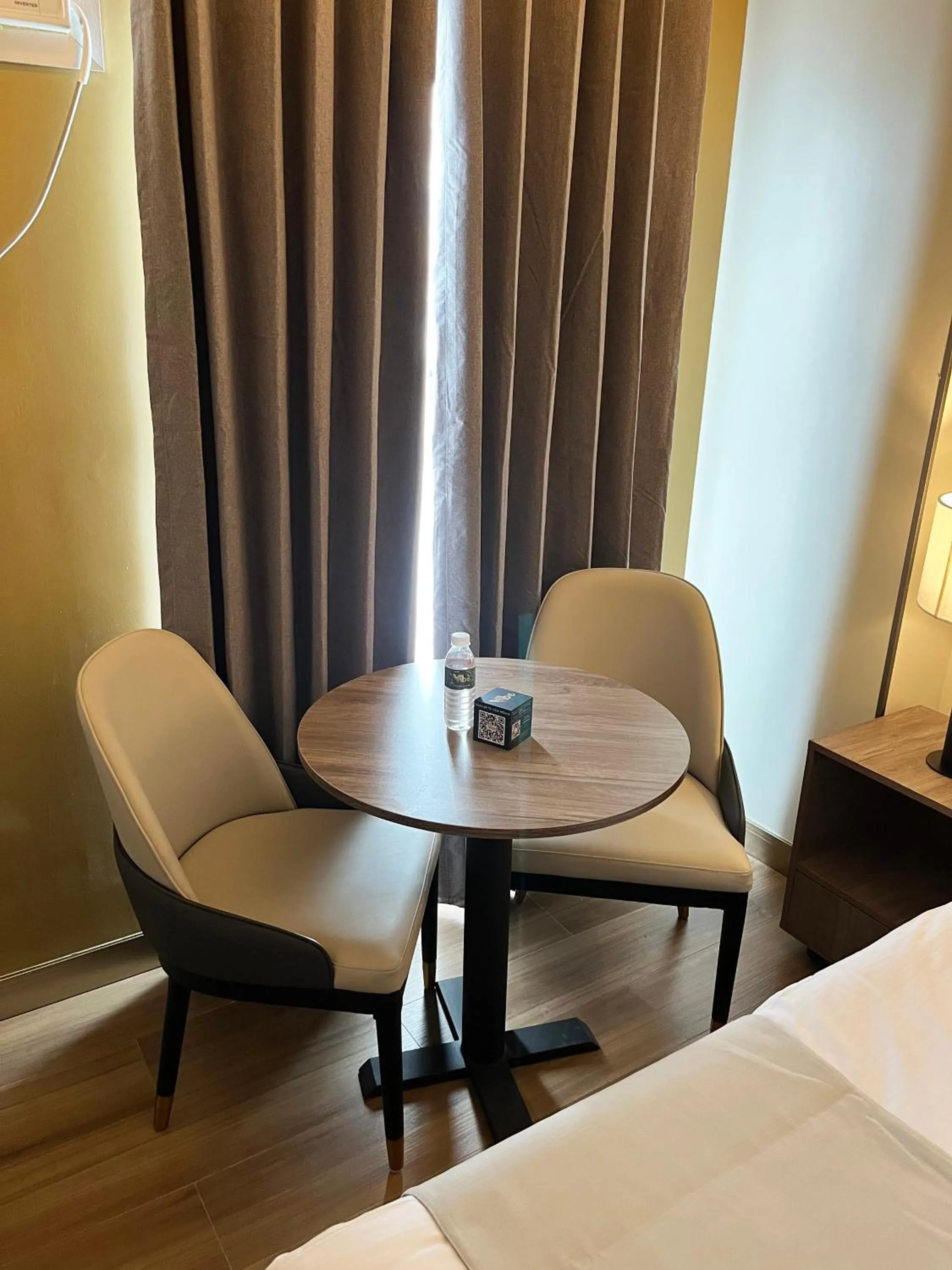 Seating area, Bed in Vibe Hotel Alabang