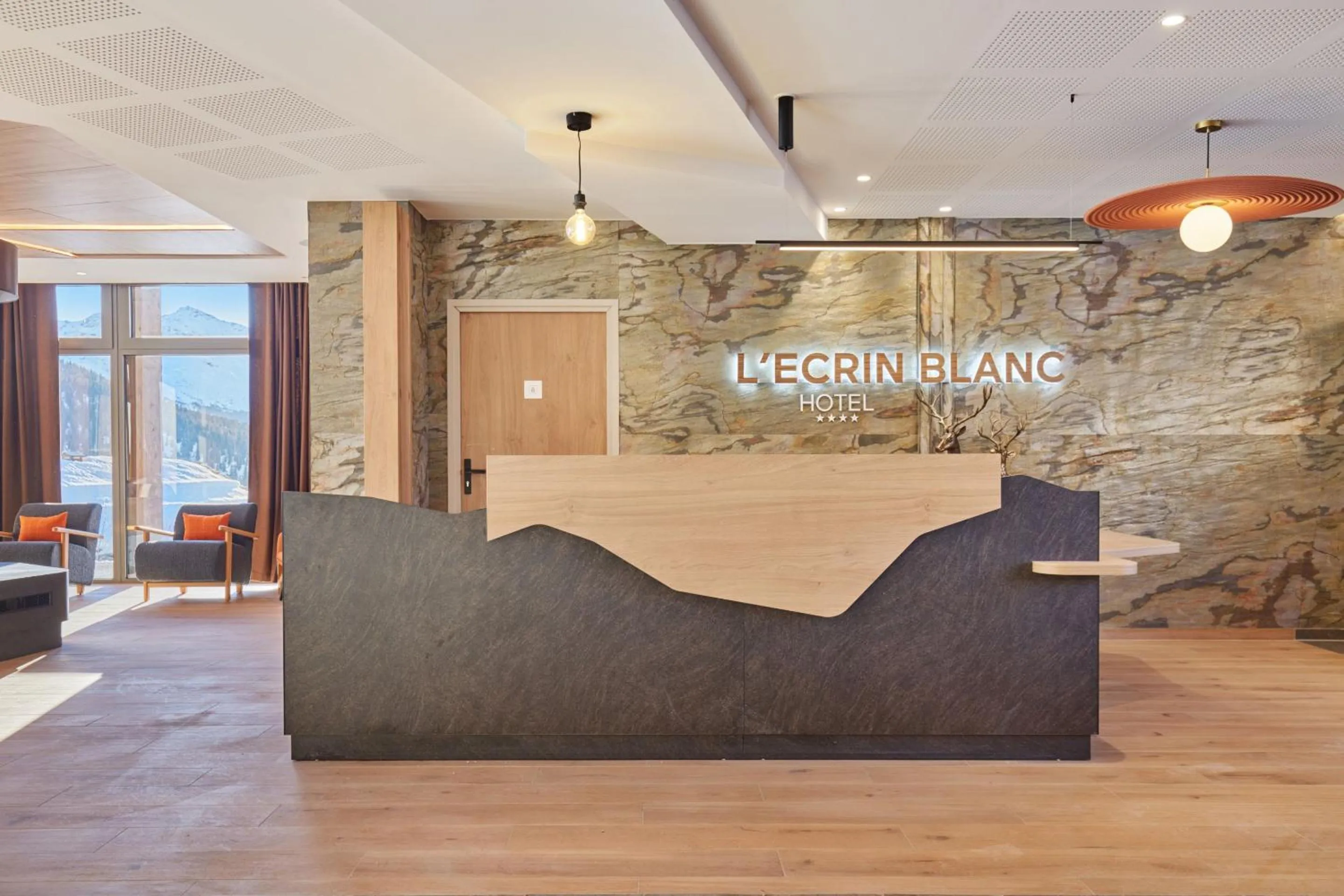 Lobby or reception in Hotel L'Ecrin Blanc by Odalys
