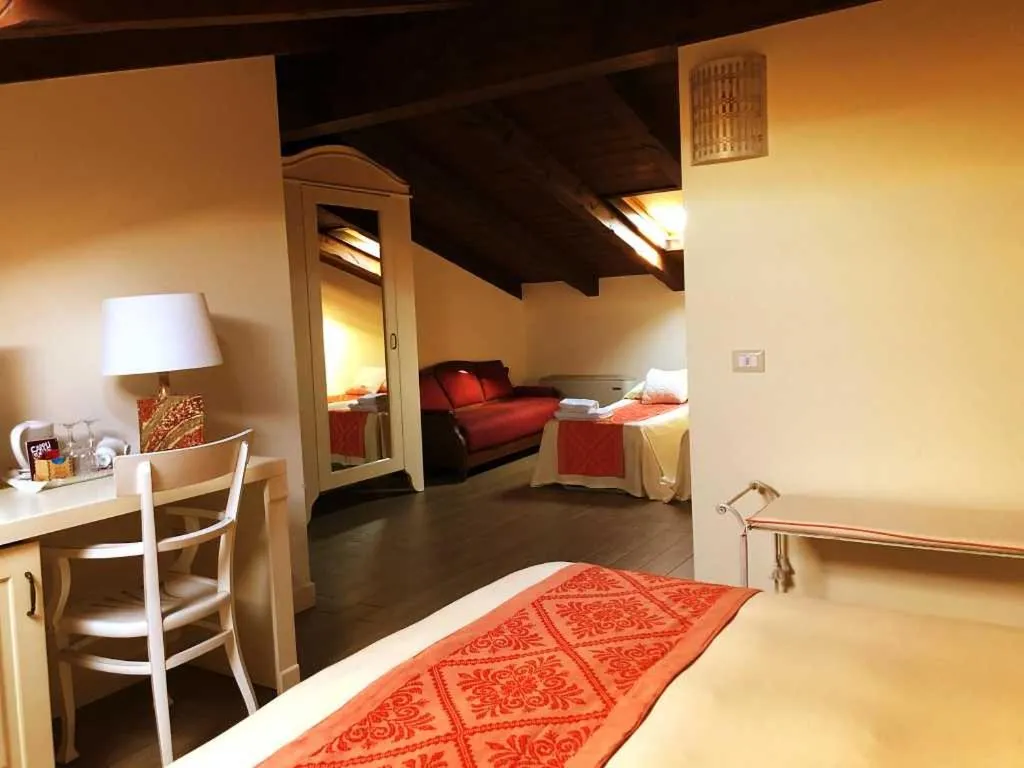 Bed in Inghirios Wellness Country Resort