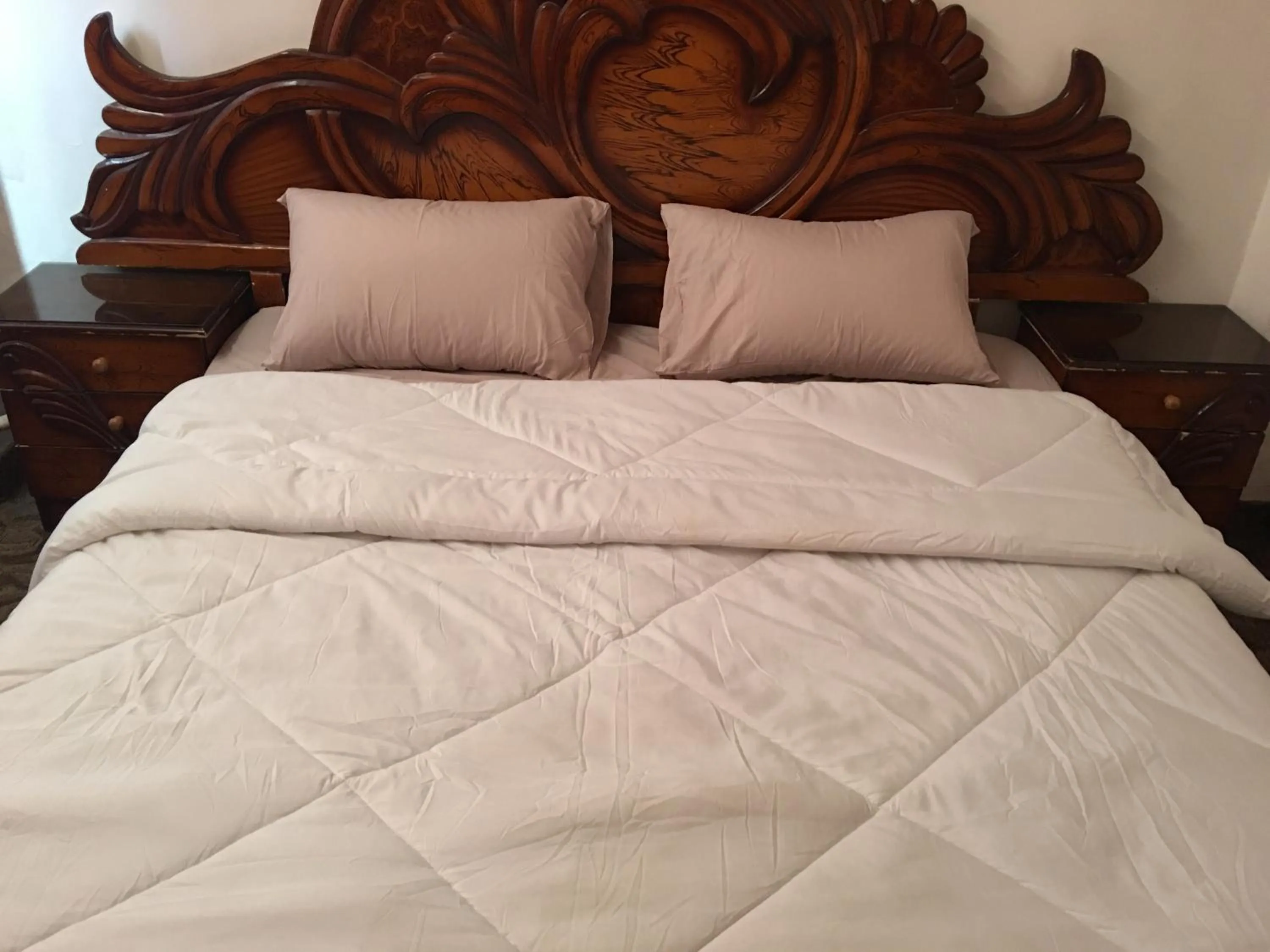 Bedroom in Aljazeera Hotel Apartments