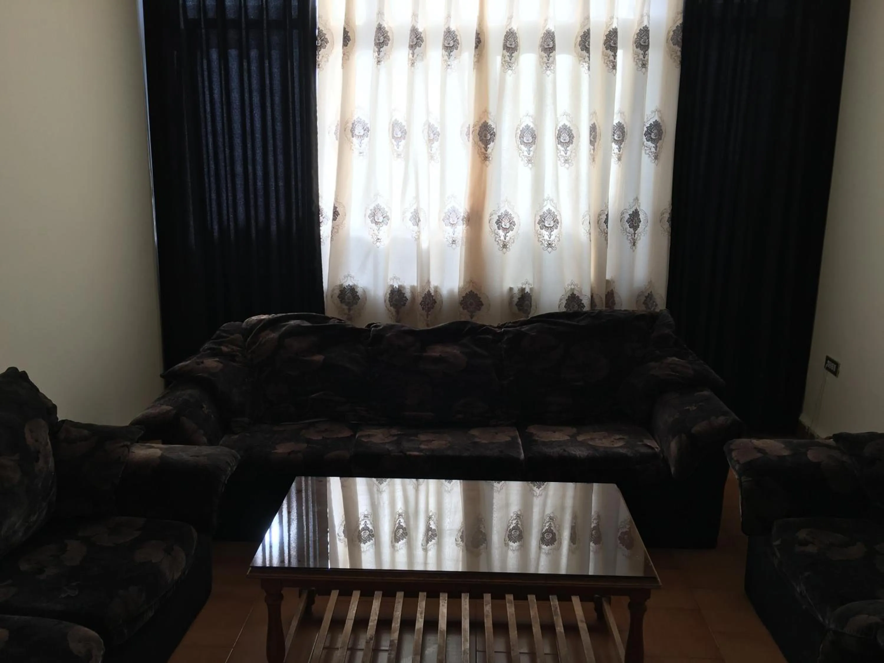 Living room in Aljazeera Hotel Apartments