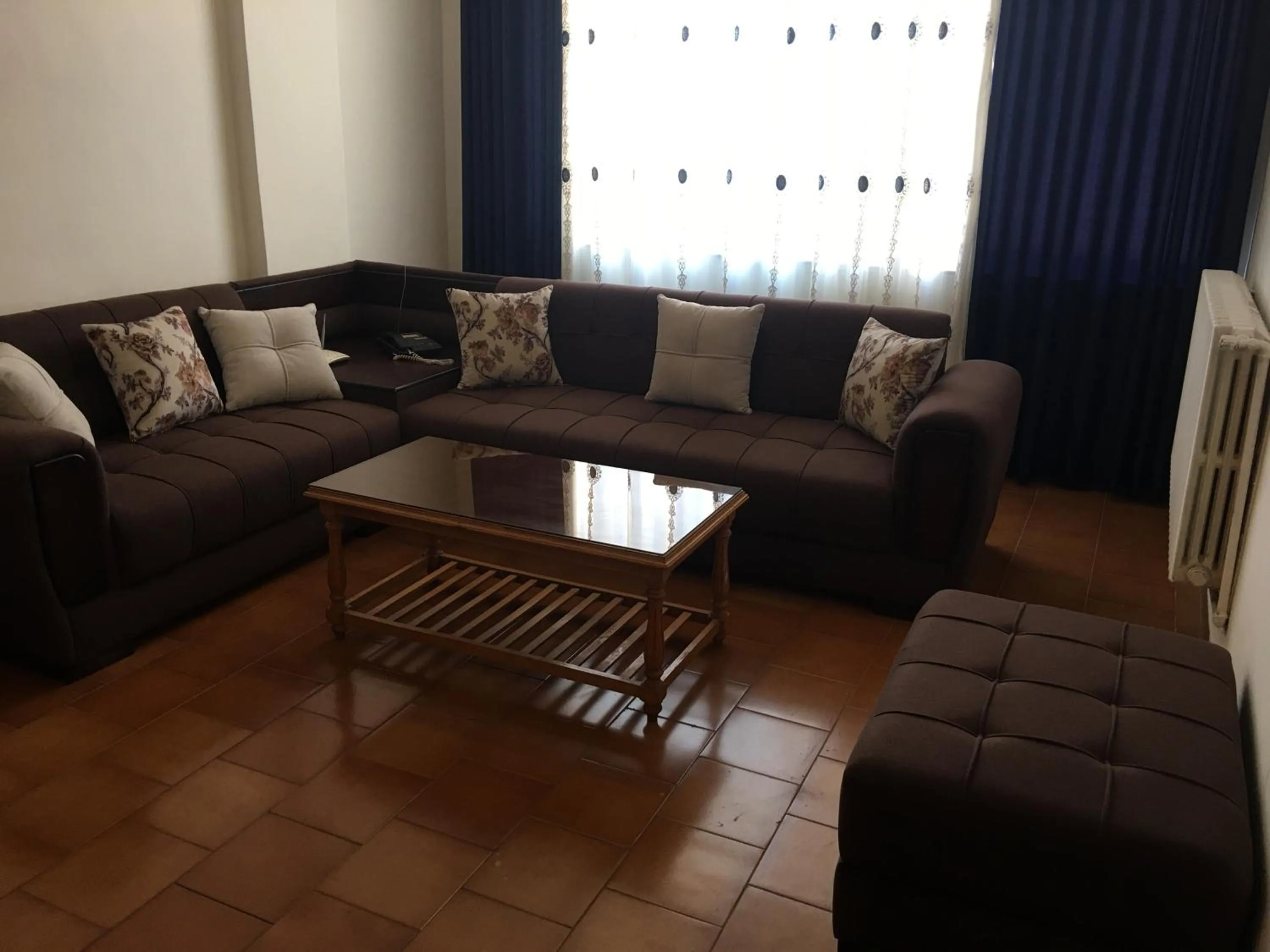 Living room in Aljazeera Hotel Apartments