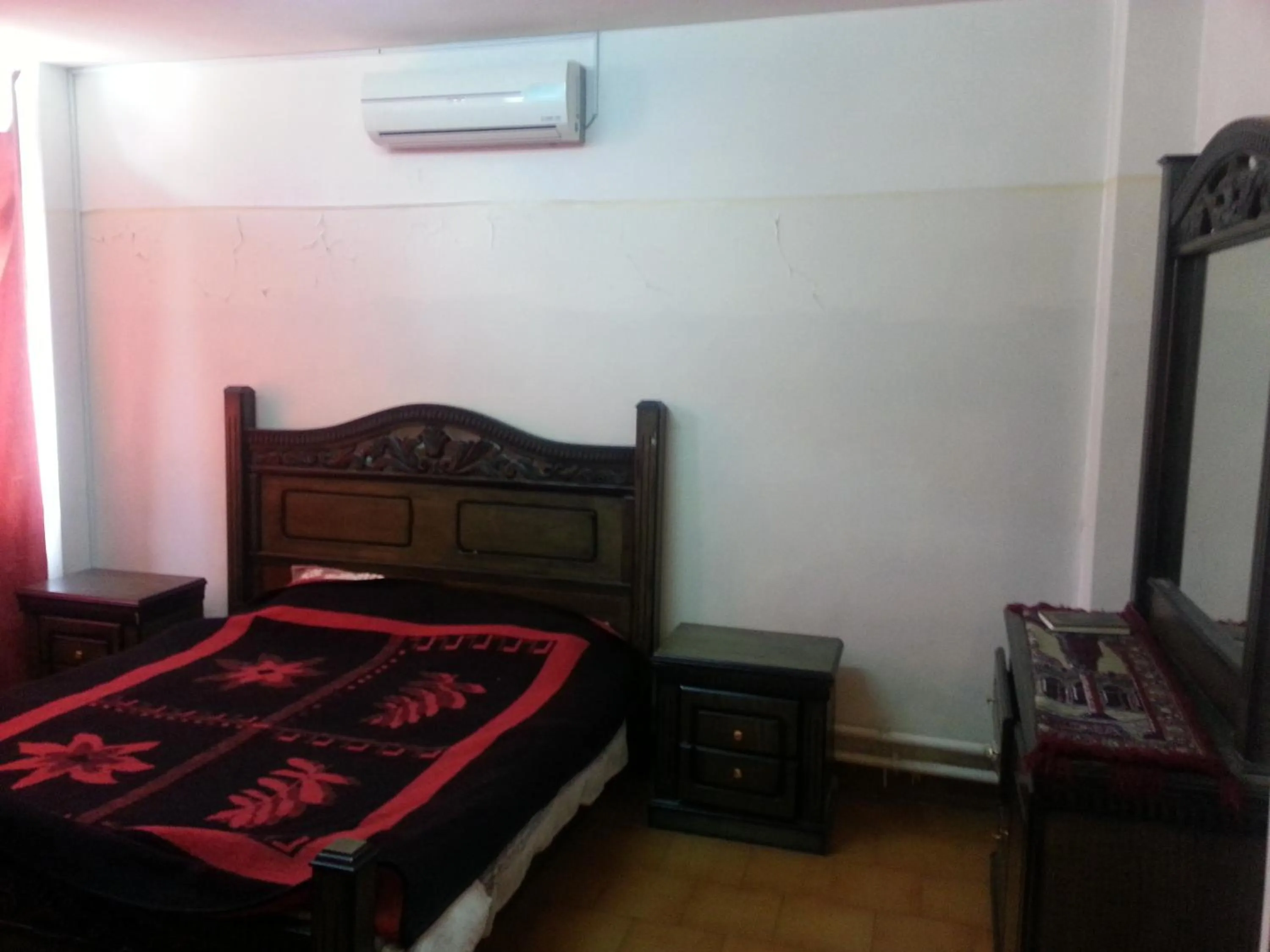 Bedroom in Aljazeera Hotel Apartments