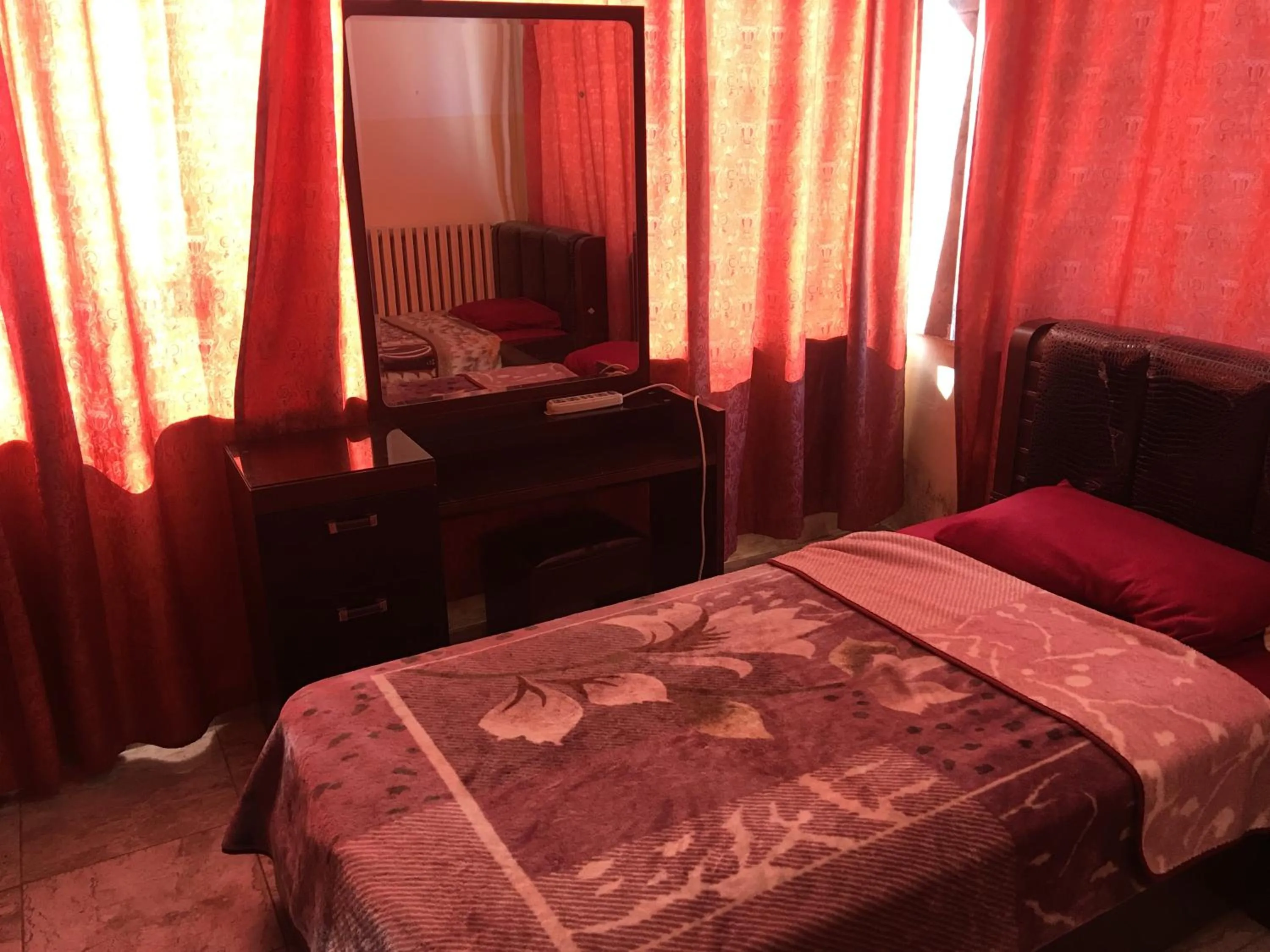 Bedroom in Aljazeera Hotel Apartments