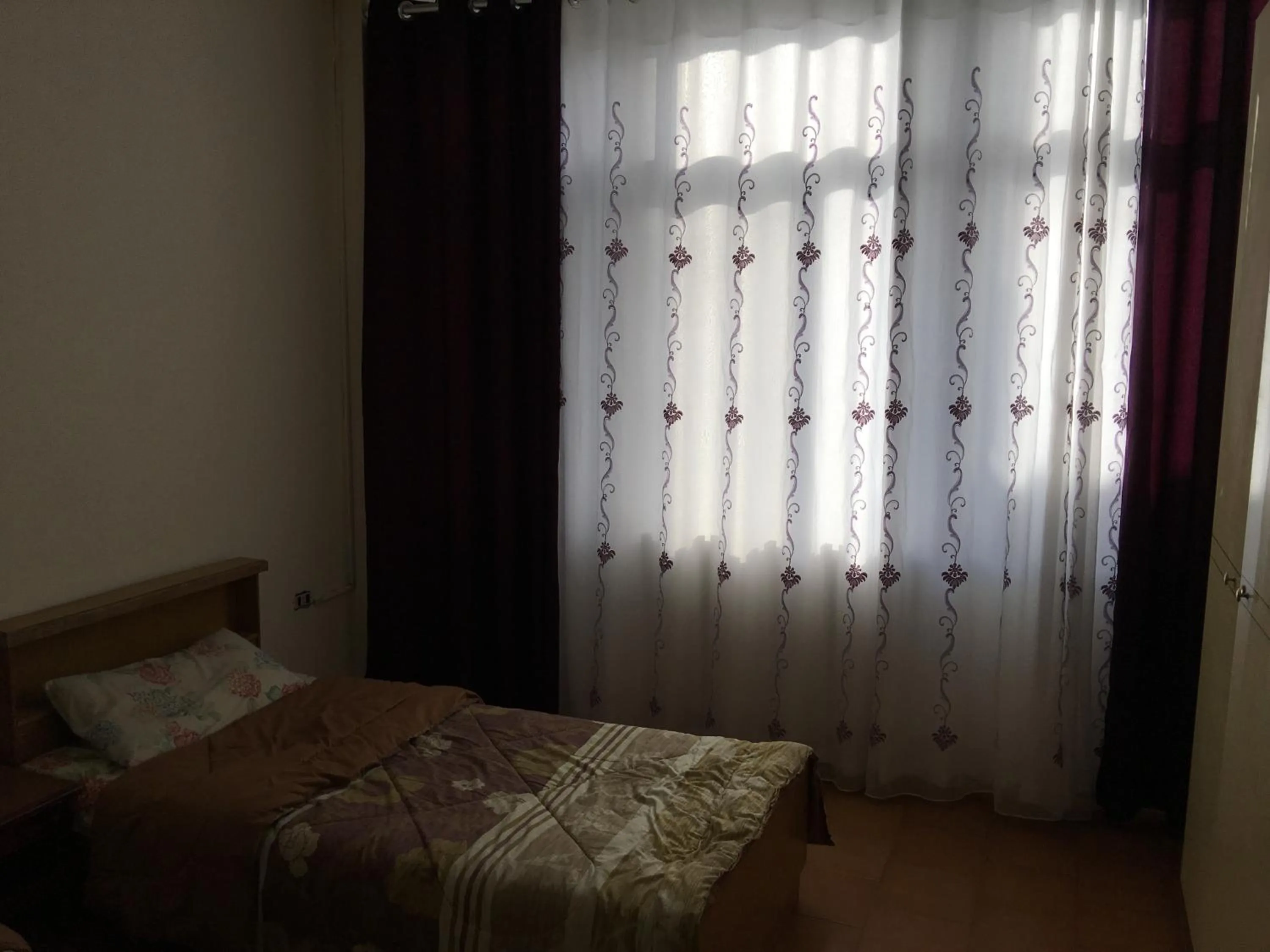 Bedroom in Aljazeera Hotel Apartments