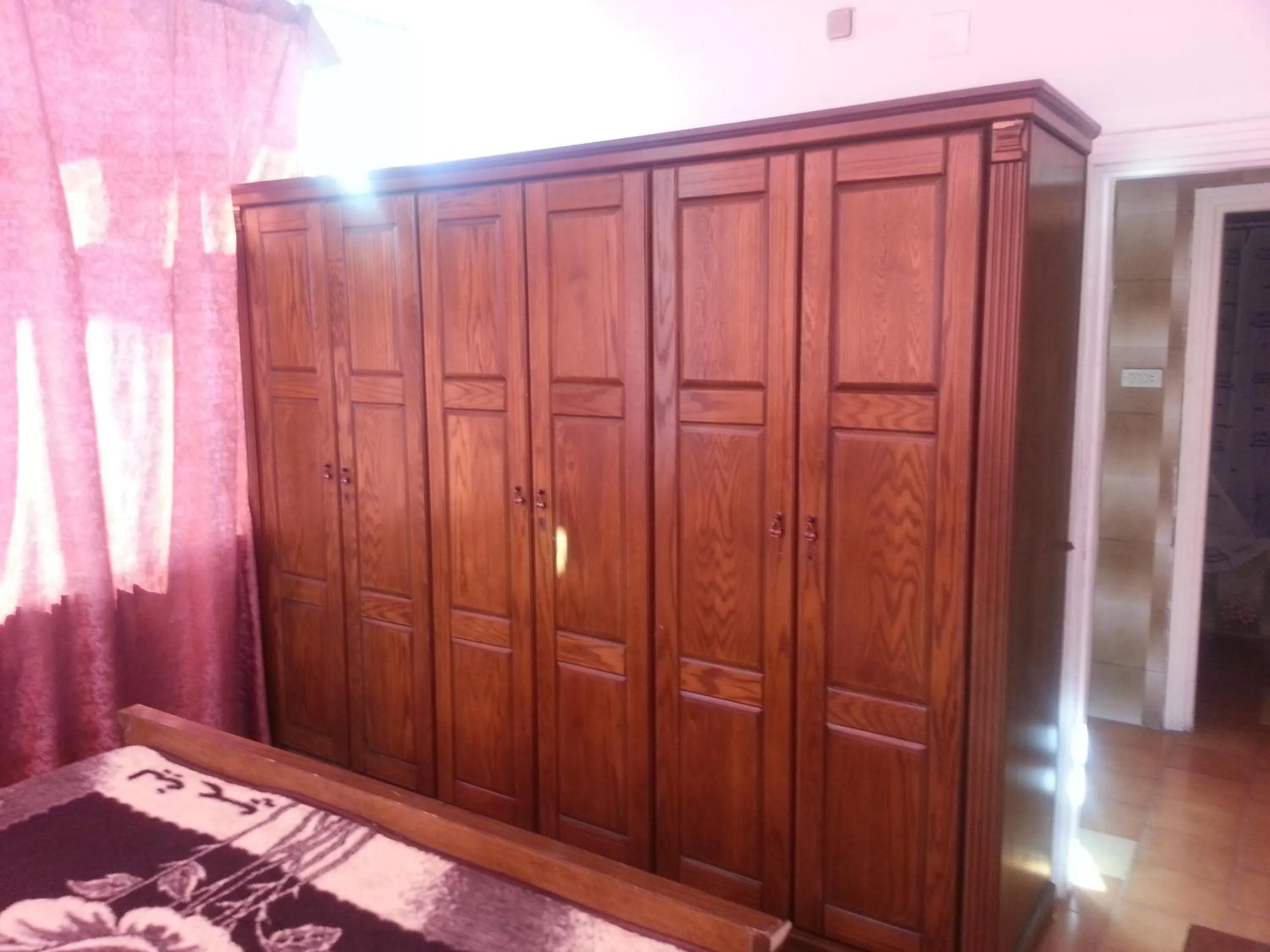 Bedroom in Aljazeera Hotel Apartments