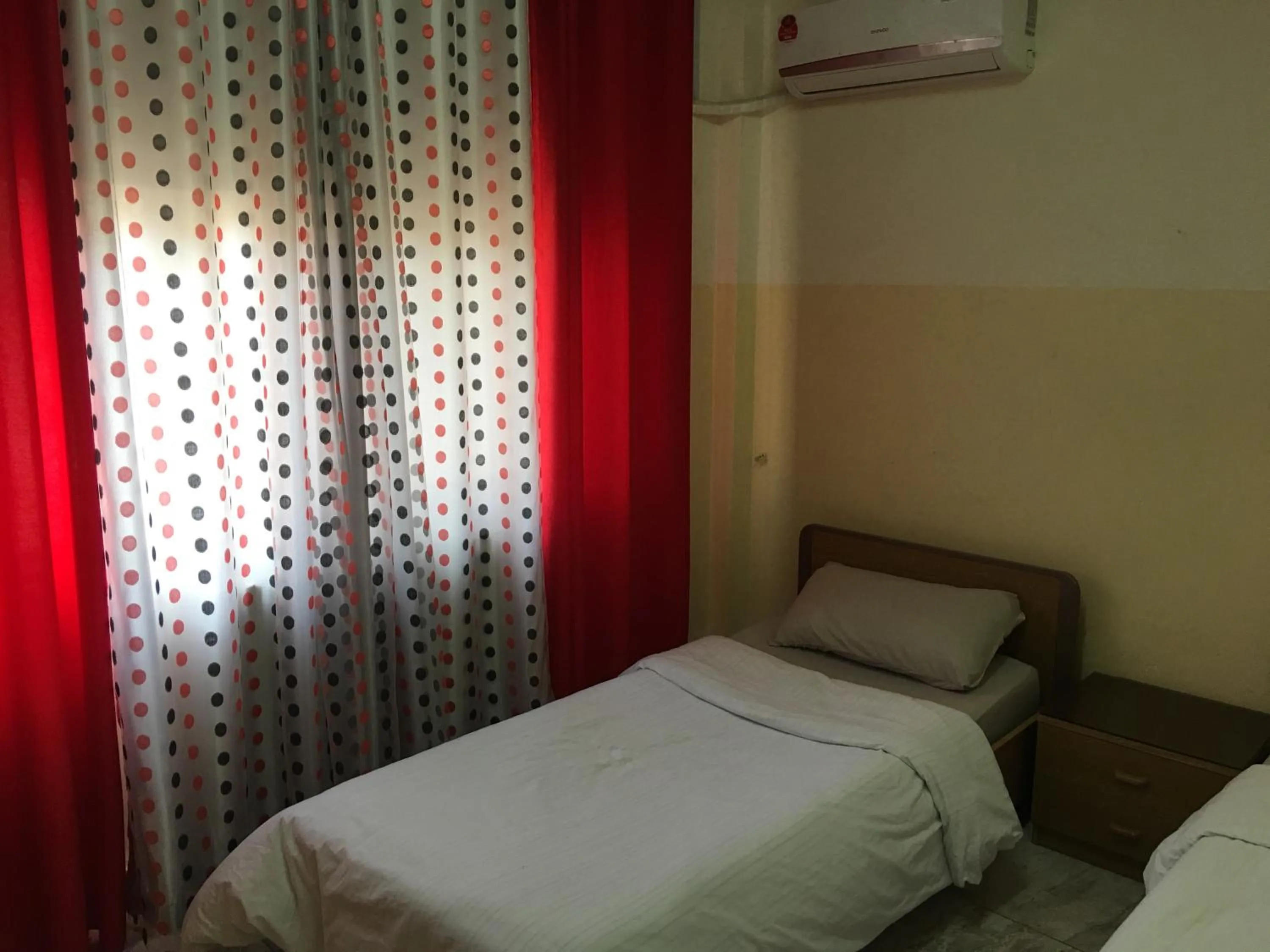 Bedroom in Aljazeera Hotel Apartments