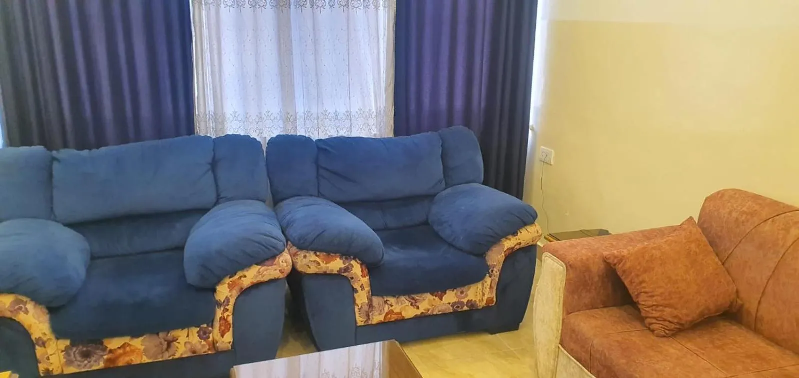 Living room in Aljazeera Hotel Apartments