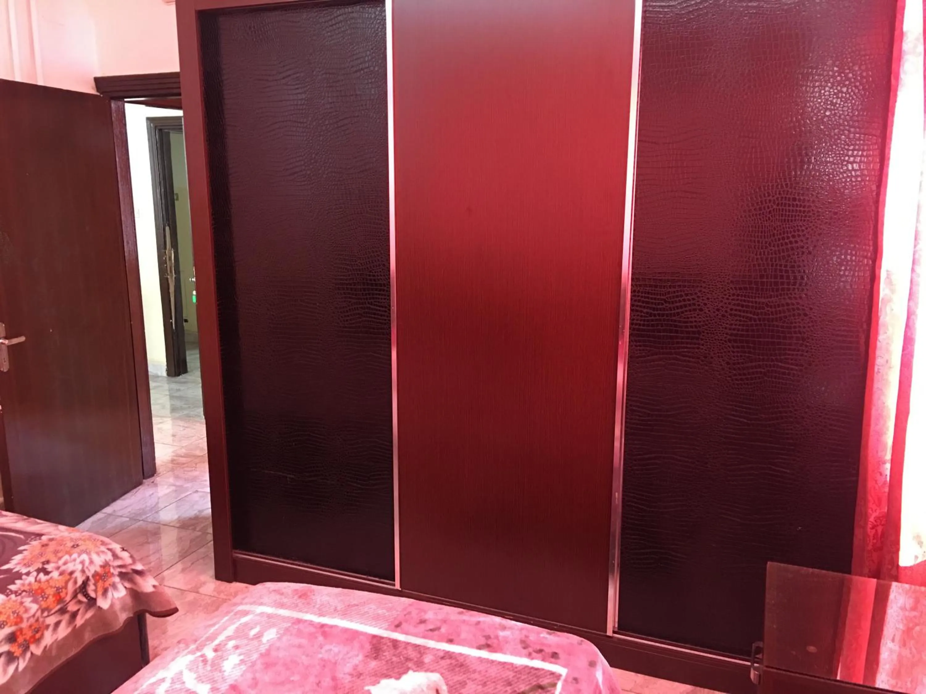 Bedroom in Aljazeera Hotel Apartments