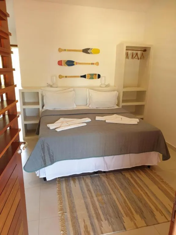 Bed in Recanto da Praia Pousada