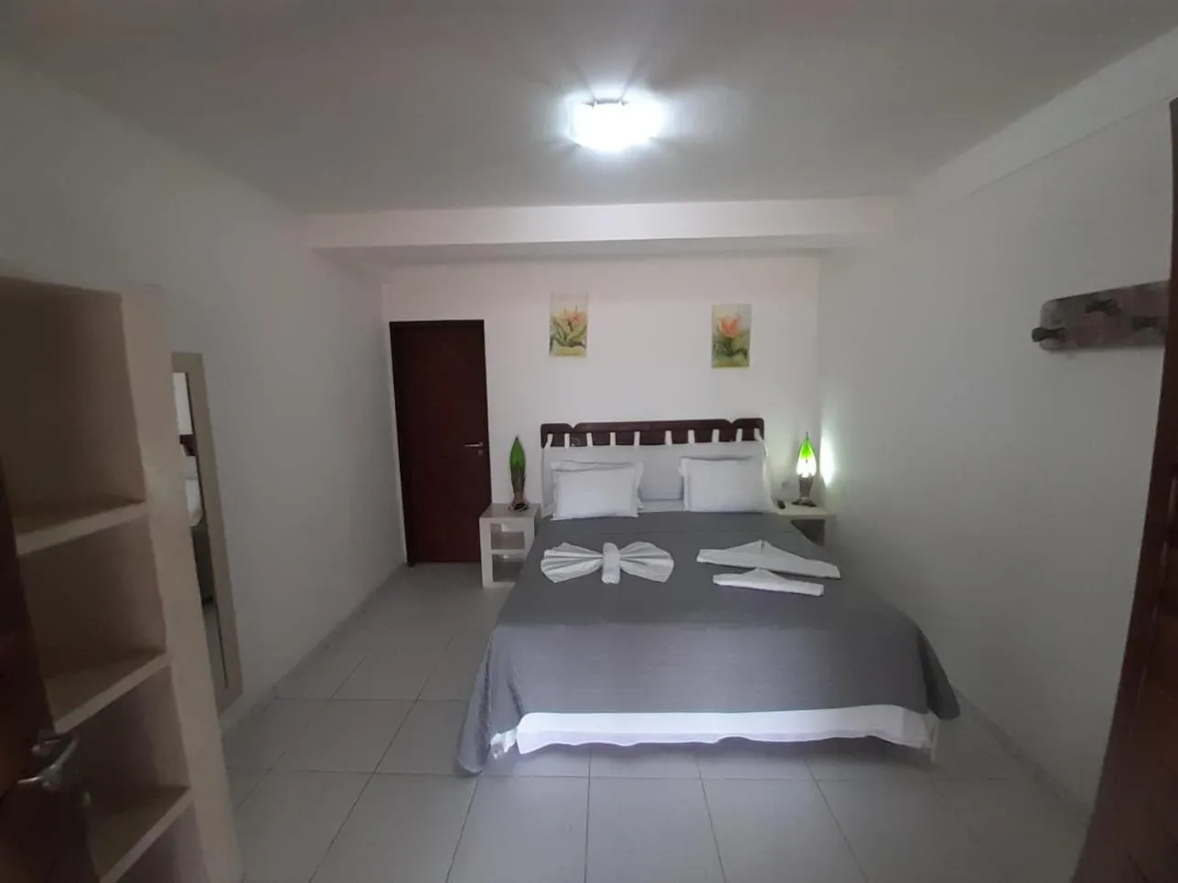 Bed in Recanto da Praia Pousada