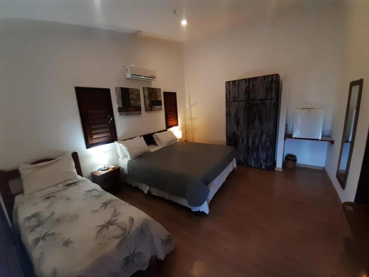 Bed in Recanto da Praia Pousada