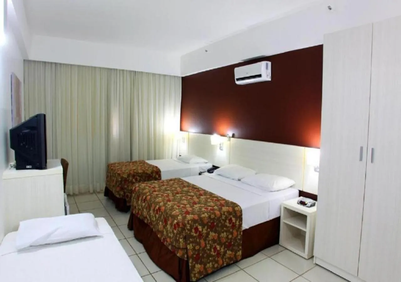 Property building, Bed in Pousada do Ipê