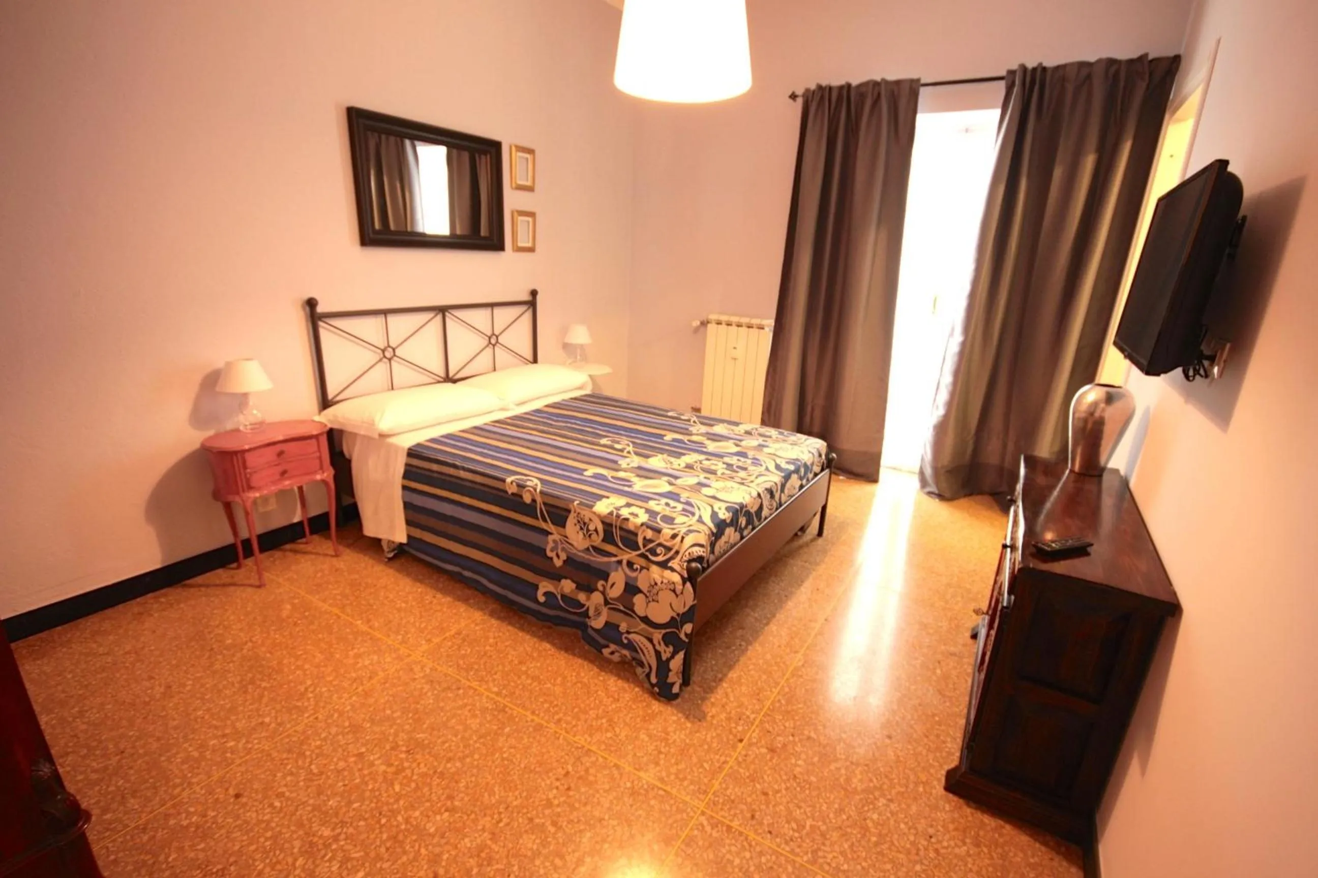 Photo of the whole room, Bed in B&B I Portici Di Sottoripa