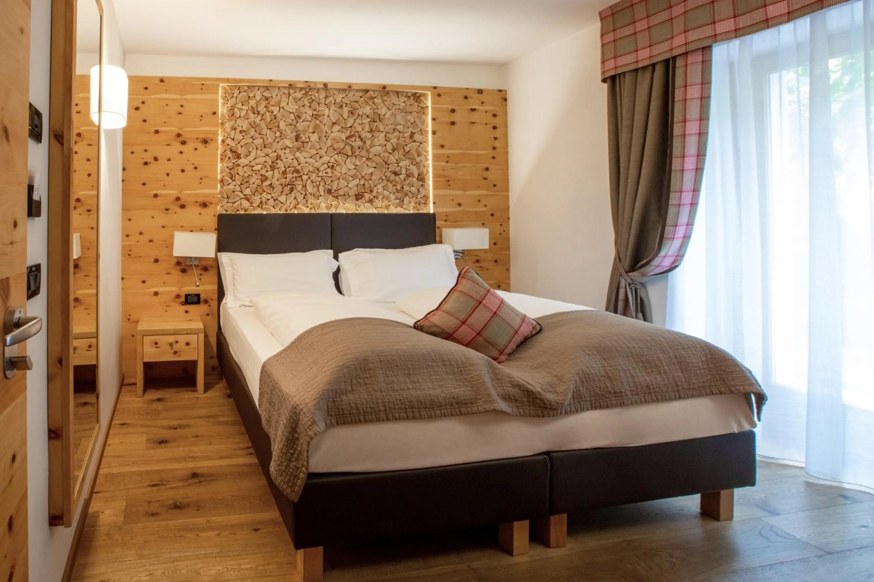 Bed in Hotel Ravelli Luxury Spa