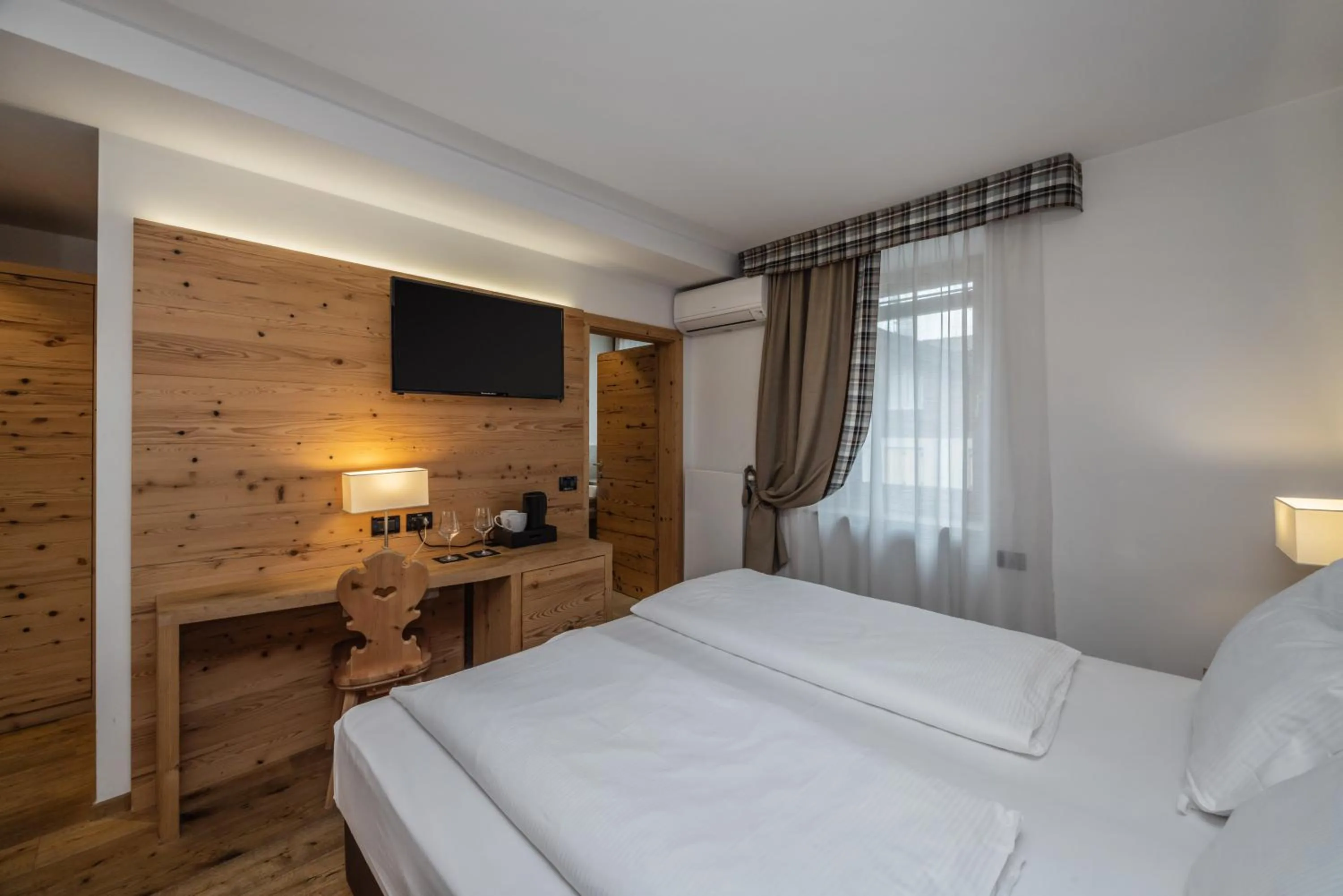 Bed in Hotel Ravelli Luxury Spa