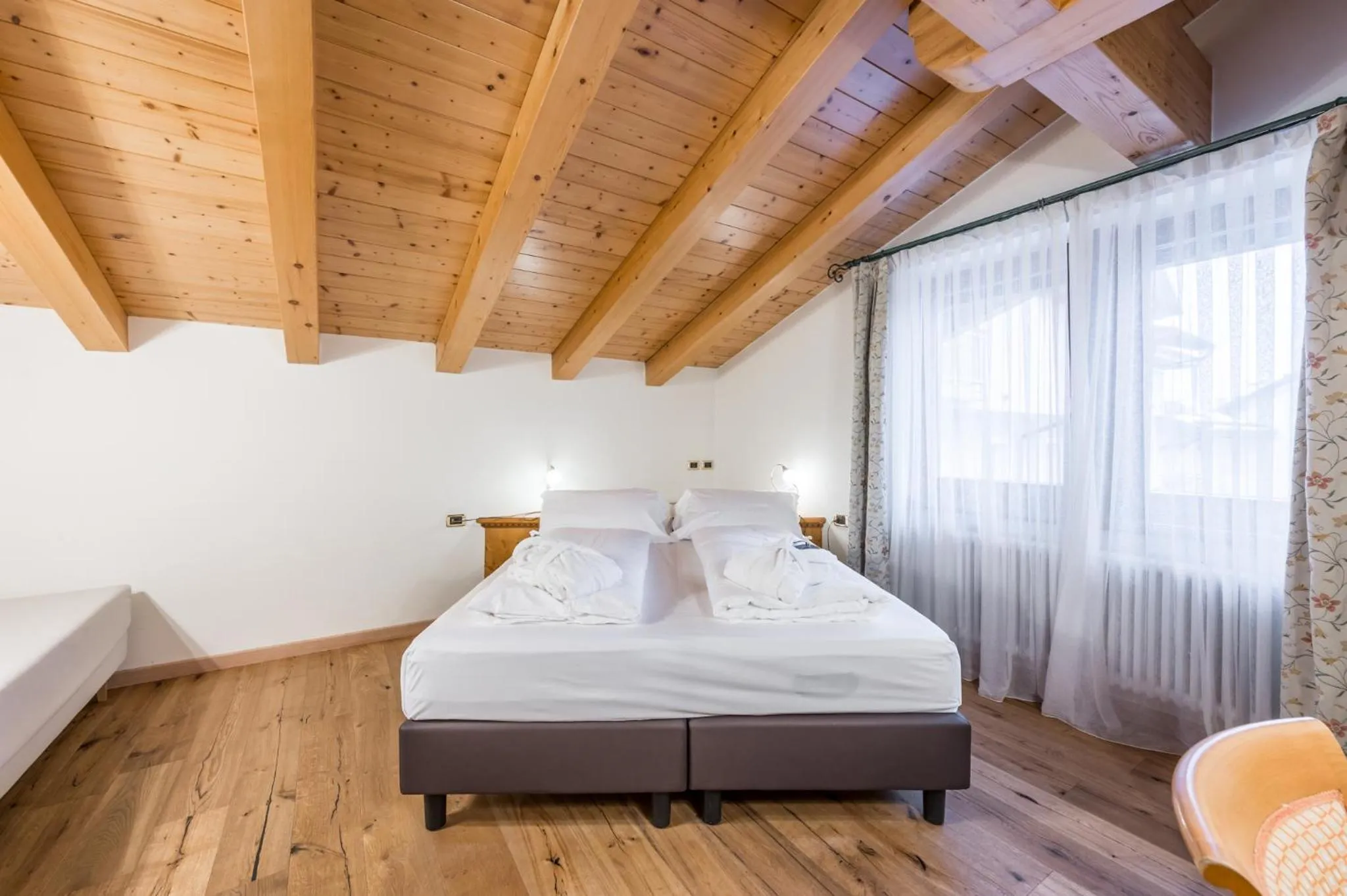 Bed in Hotel Ravelli Luxury Spa