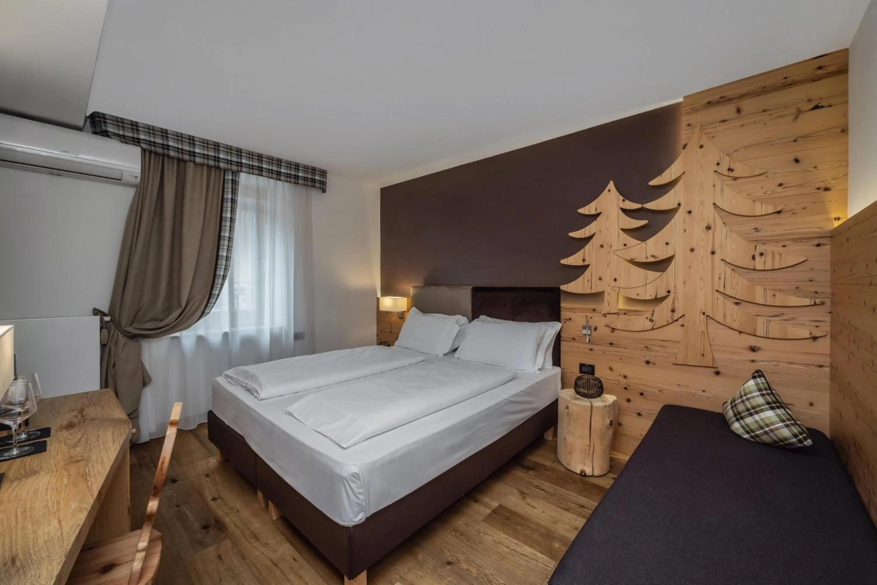 Bed in Hotel Ravelli Luxury Spa