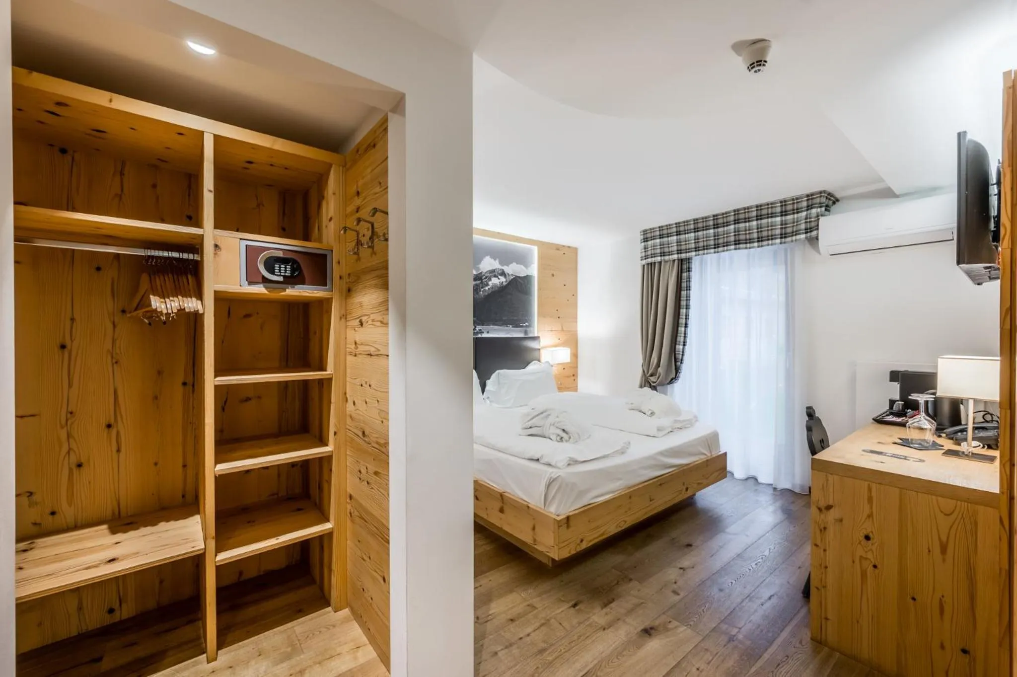 Bed in Hotel Ravelli Luxury Spa