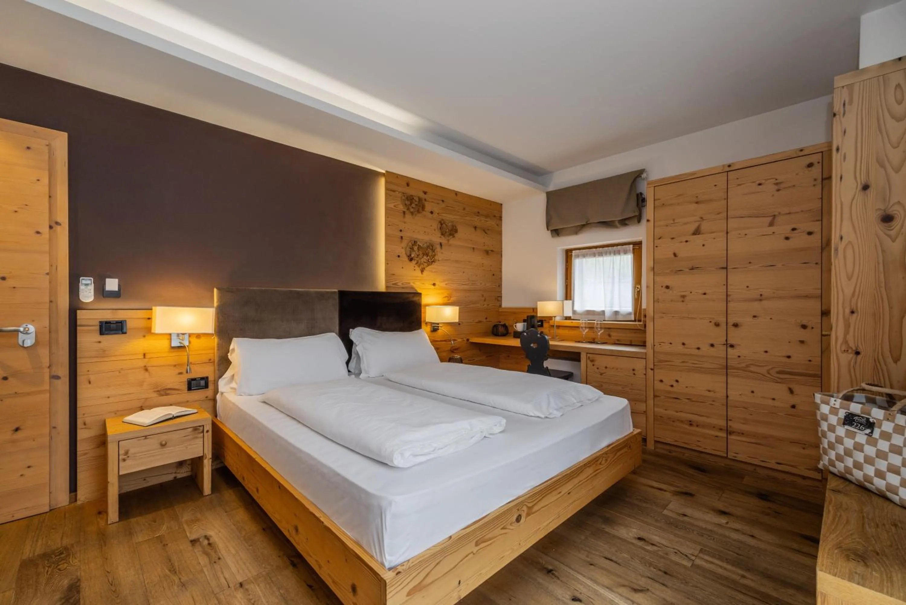 Bed in Hotel Ravelli Luxury Spa