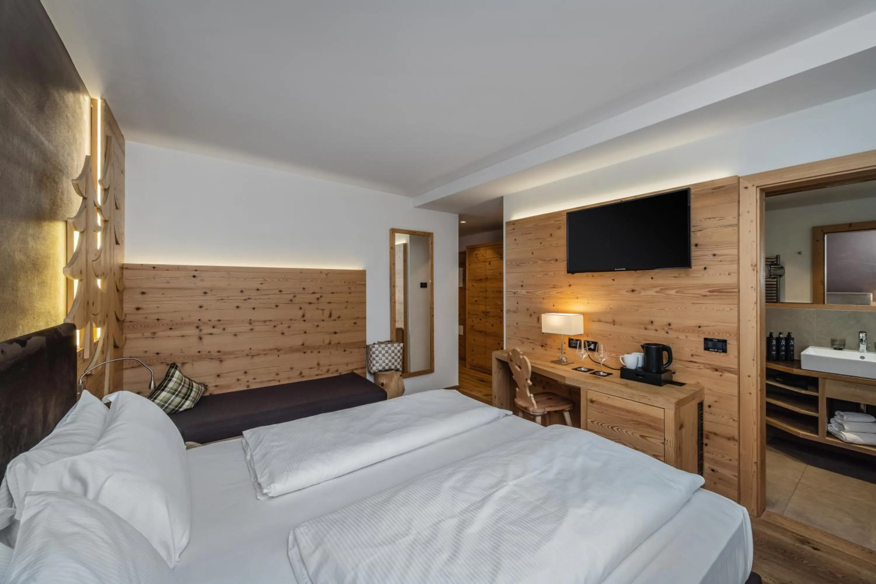 Bed in Hotel Ravelli Luxury Spa